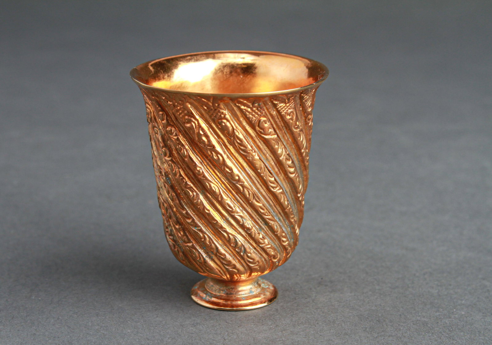 Puiforcat France Gold-Electroplate Shot-Glass: Puiforcat France gold-electroplate shot-glass, marked: "Puiforcat France / EP," includes original box. 1.875" H x 1.5" diameter.
