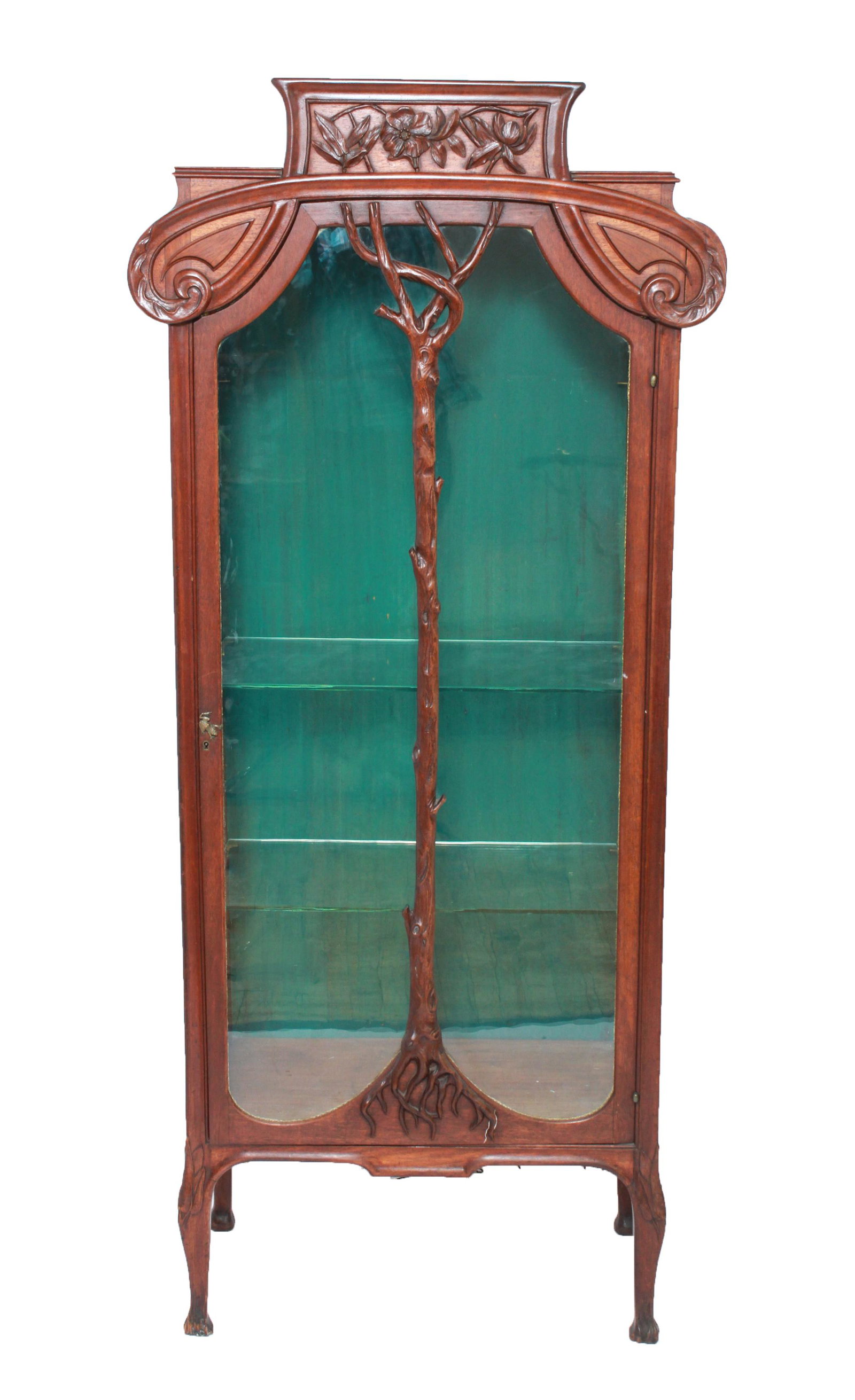 Majorelle Art Nouveau Carved Wood Vitrine Cabinet: Louis Majorelle Art Nouveau carved wood vitrine / cabinet with relief carved branch and floral motifs, glass shelving, frog accent on door frame. 67" H x 29" W x 14.25" D. Minor loss to foot.