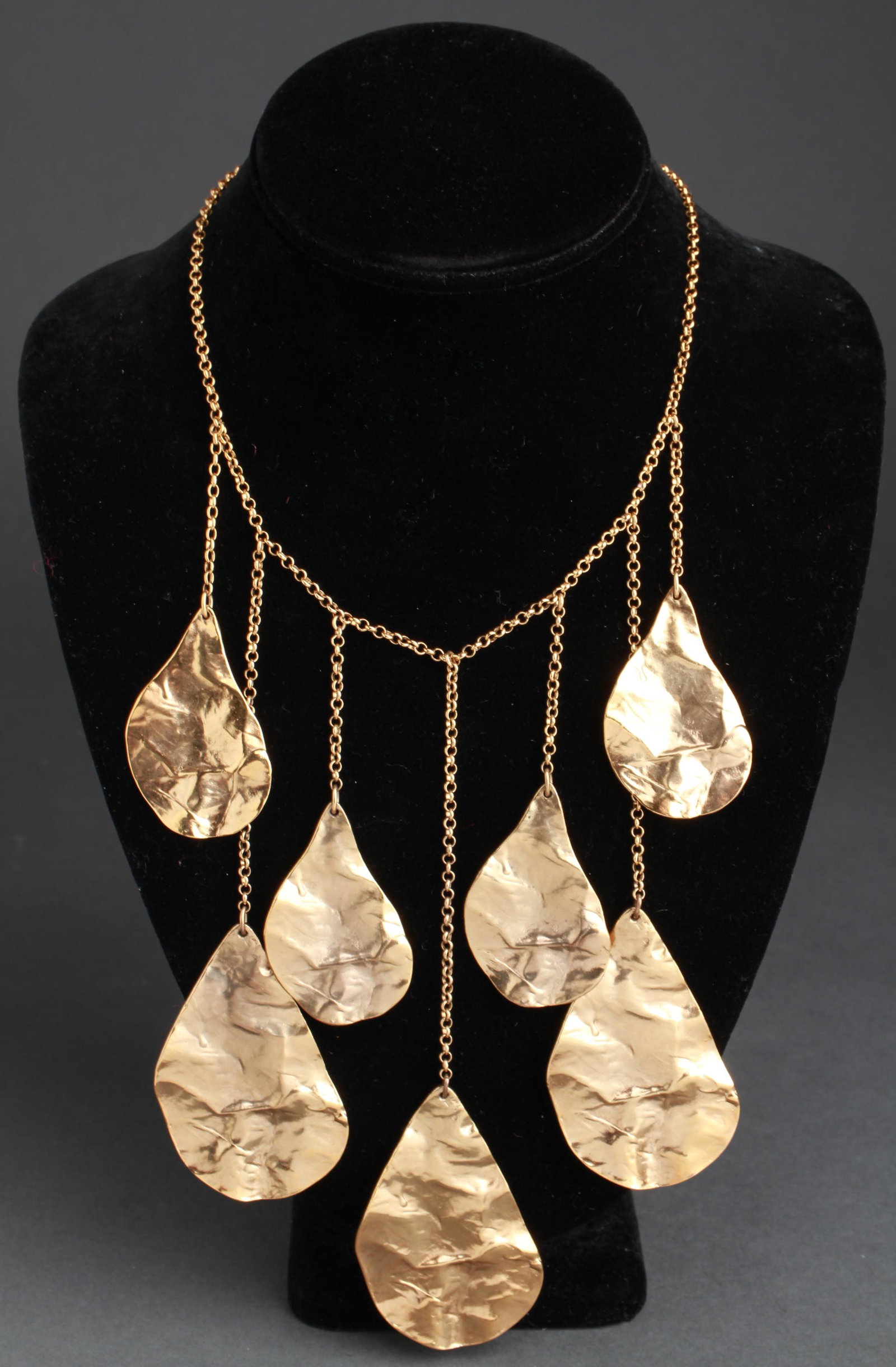 Yves Saint Laurent Gold-Tone Mobile Necklace: Yves Saint Laurent gold-tone mobile necklace with teardrop / pear-form pendants, signed: "Yves Saint Laurent." 15.25" L x 6" H.