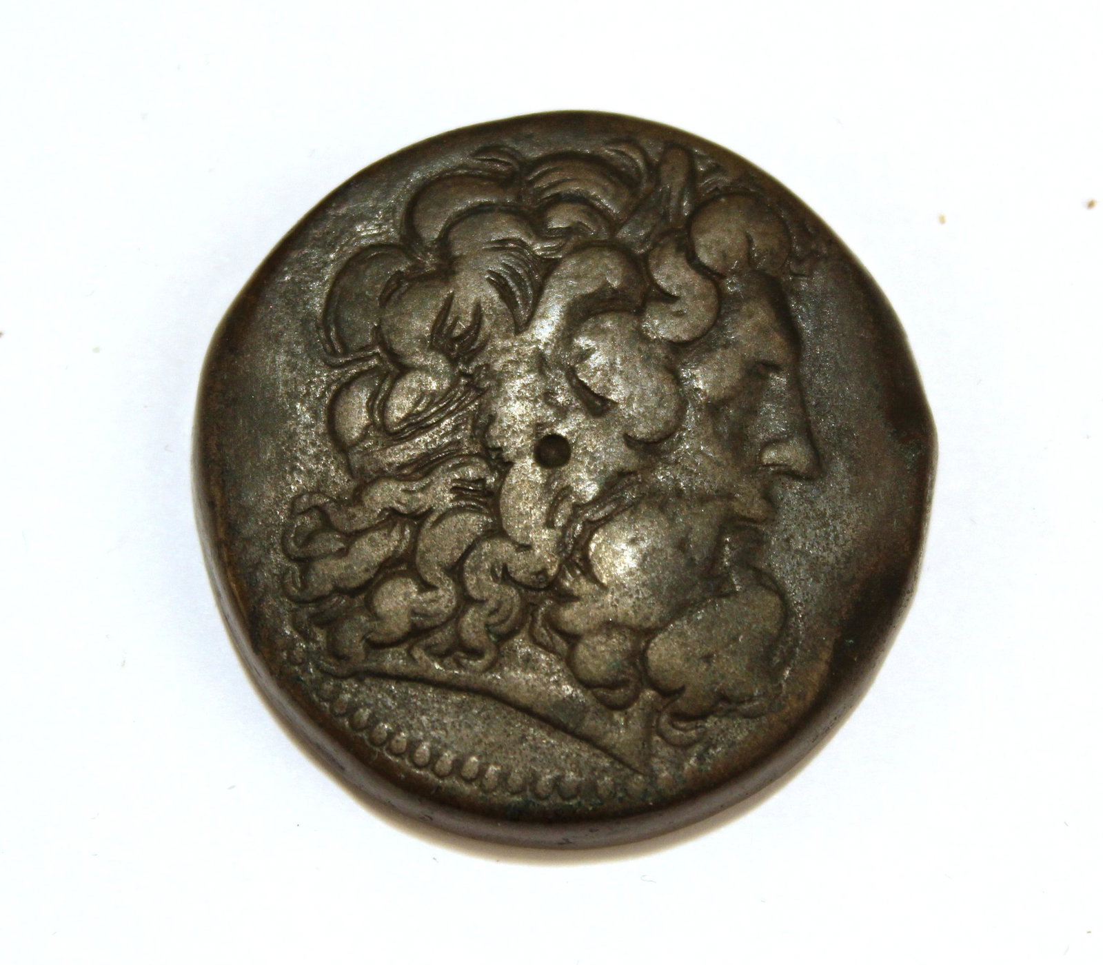 Ancient Ptolemaic Kingdom Bronze Coin: Ancient Ptolemaic (Ptolemy) Kingdom (Egypt / Greece) bronze coin, recto with profile portrait bust, reverse with eagle and inscription. 1.5" diameter. Approx: 49.8 grams; 32.0 dwt.