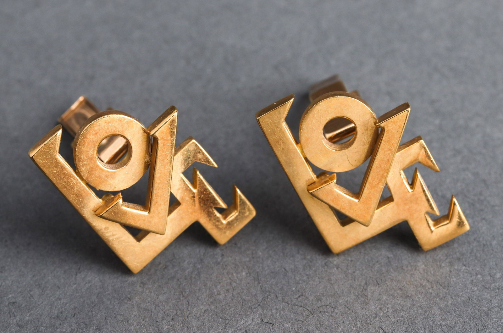 Le Blau 18K Yellow Gold "Love" Pop Art Cufflinks: Pair of Le Blau 18K yellow gold "Love" pop art cufflinks, signed: "Le Blau 18K," stamped: "14K" on backs. 1.0" L x 0.75" W x 0.625" H. Approx. 9.2 dwt.