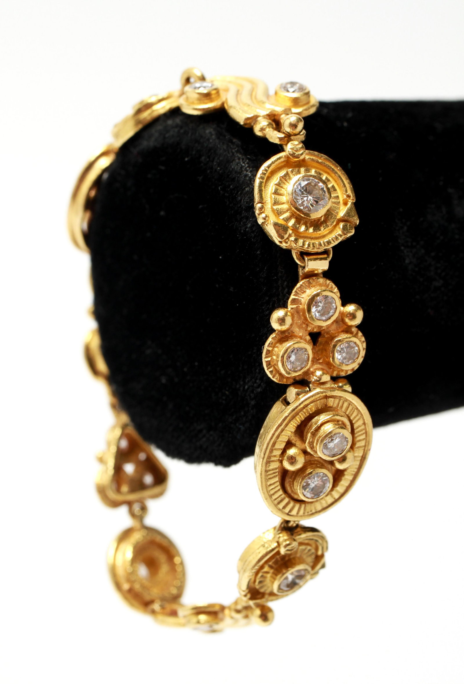 22K Yellow Gold & Diamonds Bracelet: High karat 22K yellow gold and diamonds bracelet, marked: "22K / RC / MSK," and clasp marked: "22K / 18K / RRC." 6.625" L. Approx: 21.7 dwt inclusive.