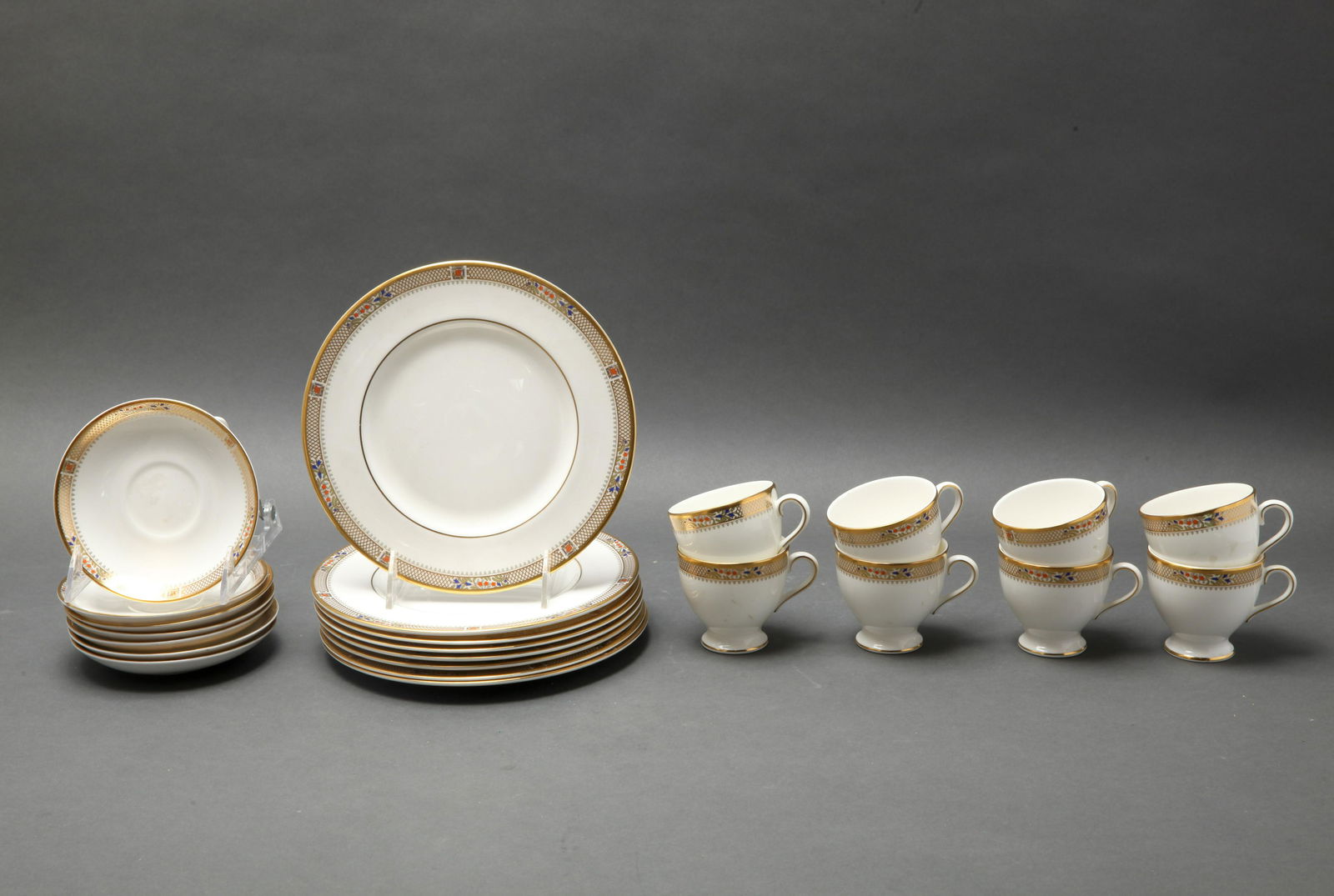 Minton "Caliph" Bone China Tea Service, 23: Minton porcelain "Caliph" bone china tea service, 23 pieces, comprising eight cups, seven saucers and eight dessert plates, all bearing full maker's mark underneath. Largest: 8" diameter.