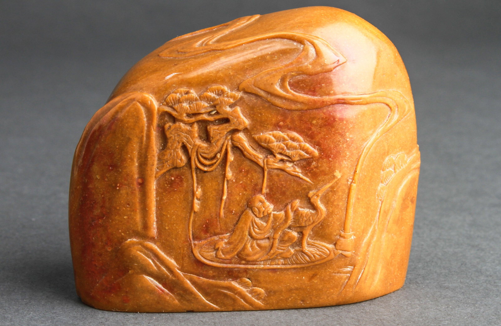 Chinese Carved Hardstone Seal w Man & Bird: Chinese 19th century carved hardstone seal, depicting scene with man and bird in landscape, with fitted storage case. 2.25" H x 3" W.