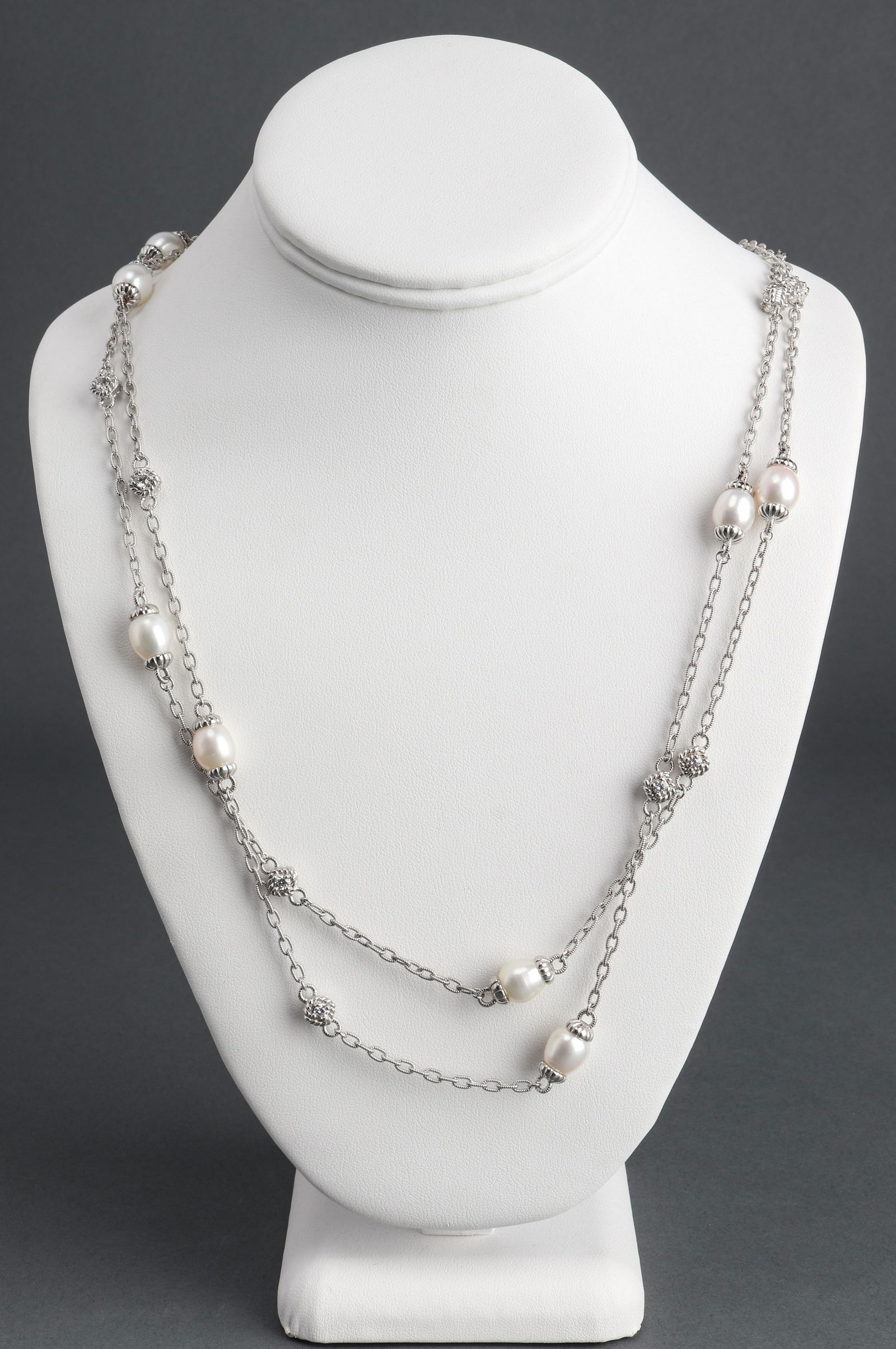 Judith Ripka Silver Cultured Pearl & CZ Necklace: Judith Ripka silver cultured fresh water pearl and cubic zirconia necklace, comprising twelve pearls approx: 10 mm x 9mm and twenty-three cubic zirconia stones with designer lobster clasp. Stamped "Ju