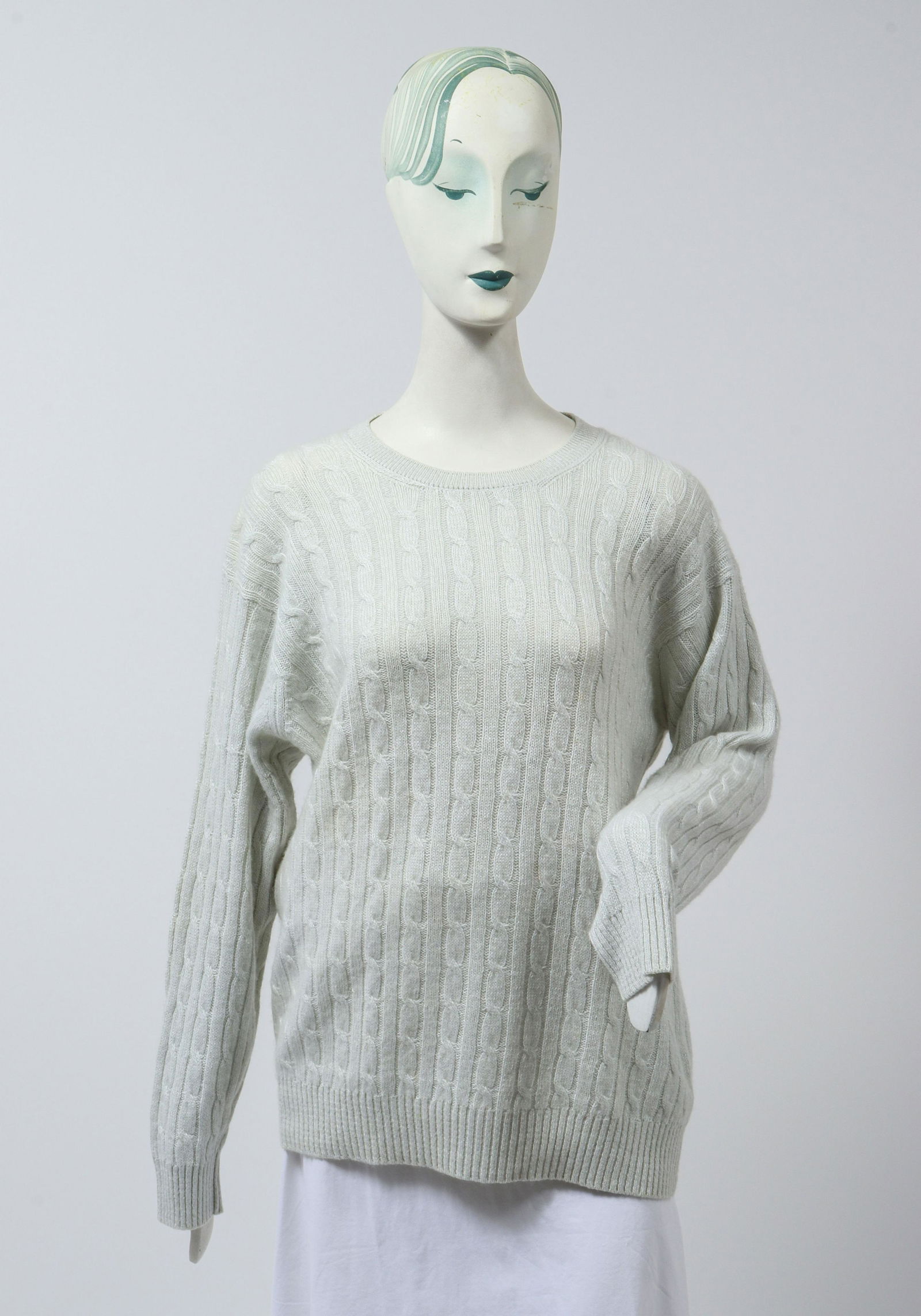 Brioni White Cable Knit Sweater: Brioni white cable knit sweater, maker's tag labeled: "Brioni Made in Italy." Sleeves: 27" L; armpits: 17" W; length: 28" L.