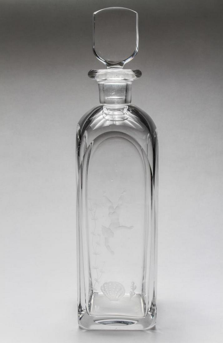 Orrefors Cut Crystal "Pearl Diver" Decanter, Rare: Rare Orrefors colorless hand-blown crystal "Pearl Diver" decanter, designed by Vicke Lindstrand, one side with a copper wheel-cut nude pearl diver descending to a seaweed-surrounded giant clam shell e