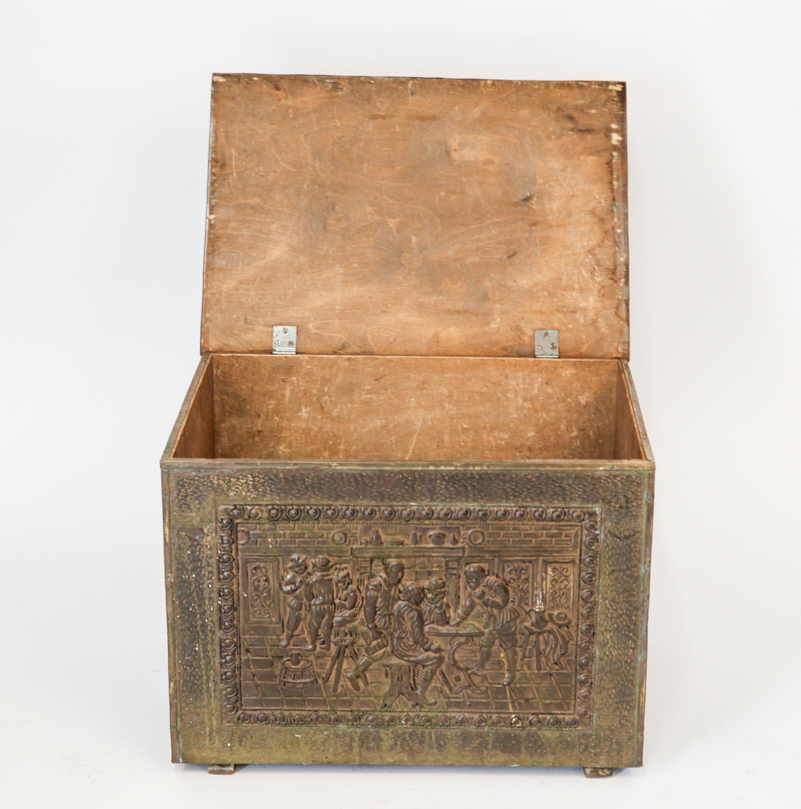 Renaissance Manner Repousse Brass Storage Chest: Renaissance manner repousse and chased brass storage chest, 20th century, the top and sides centered with interior scenes. 17" H x 23.25" W x 16.5" D.