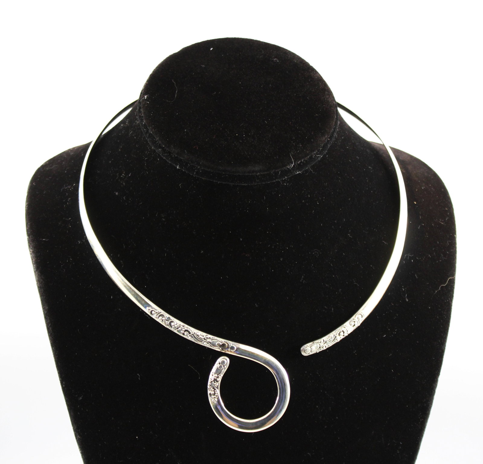 Sarda Sterling Silver Collar Necklace: Sarda sterling silver collar necklace with Indonesian style scrolling accents at either end, marked "Sarda 925." 6" wide (17" Circumference). Approx. 1.16 ozt.