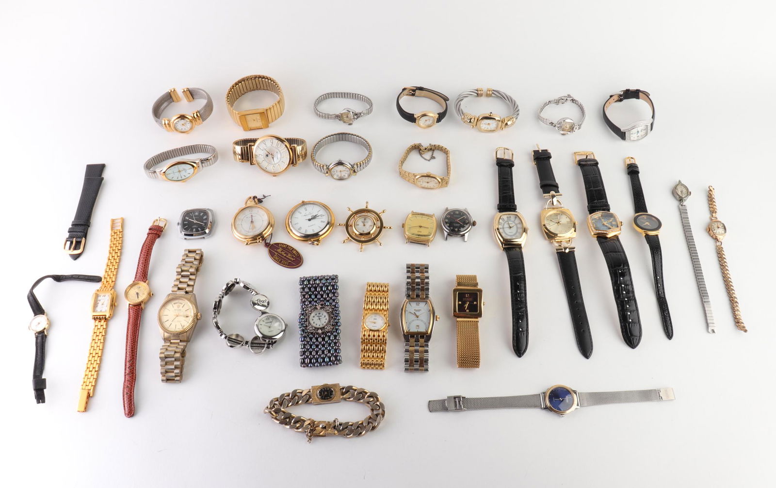 Ladies' Assorted Wristwatches, Incl. 30: Assortment of thirty ladies' wristwatches, including brands like Rolex, Pastorelli, Elgin. Sheffield, Timex, Seiko, Joan Rivers, and more, the Rolex reproduction marked "Oyster Perpetual Day Date." Ro
