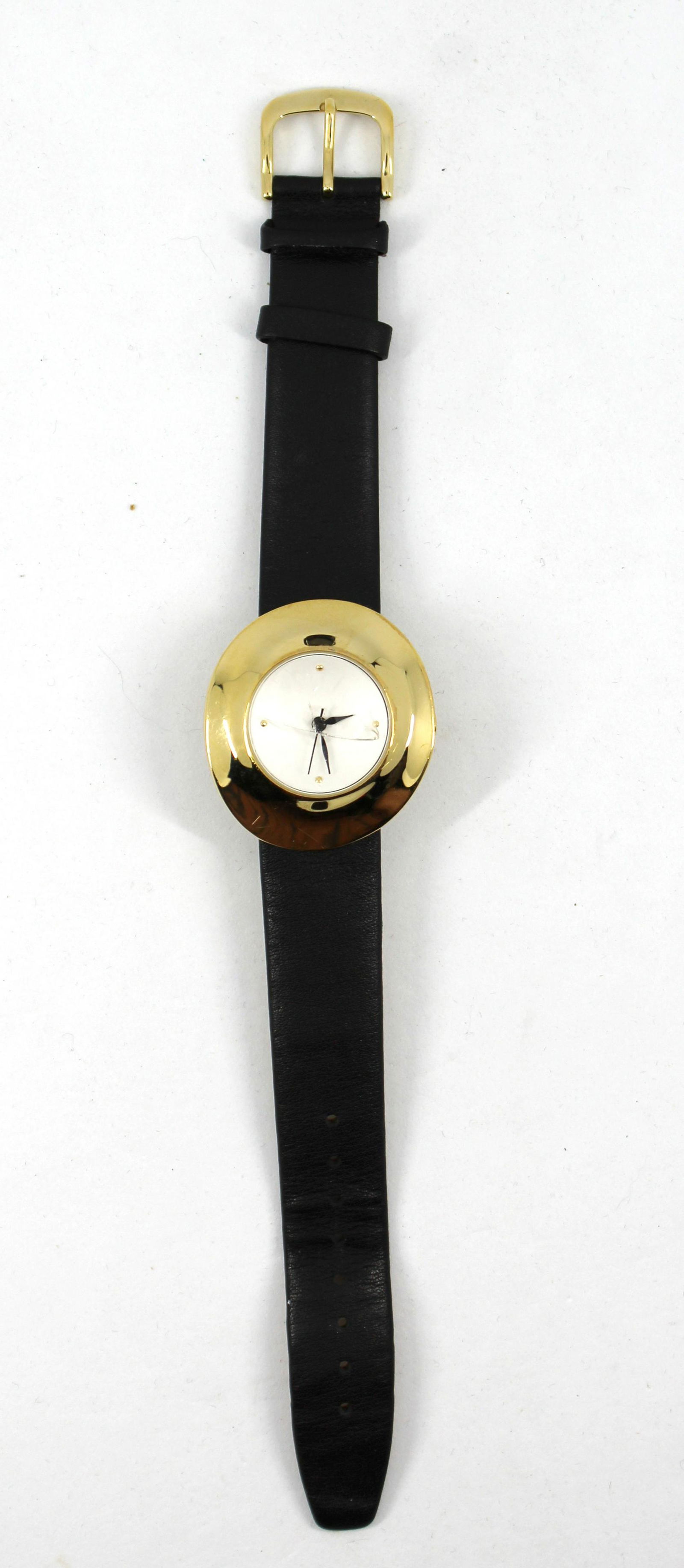Robert Lee Morris Studio Ladies' Watch: Robert Lee Morris Studio ladies' wristwatch, quartz, Japan movement, stainless steel backing, gold-tone bezel, genuine leather strap, signed "RLM Studio." 8.5" L. Damage to glass.