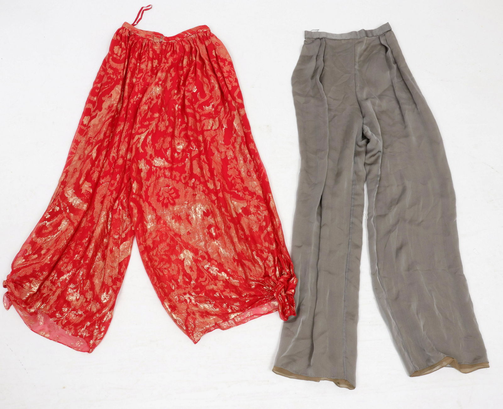 Bill Blass Women's Chiffon Pants, 2: Two pairs of Bill Blass women's pants, including a pair of sheer chiffon trousers and a pair of palazzo pants with metallic thread, both labeled for Bill Blass. Orange pants: waist: 25.5" L; length to