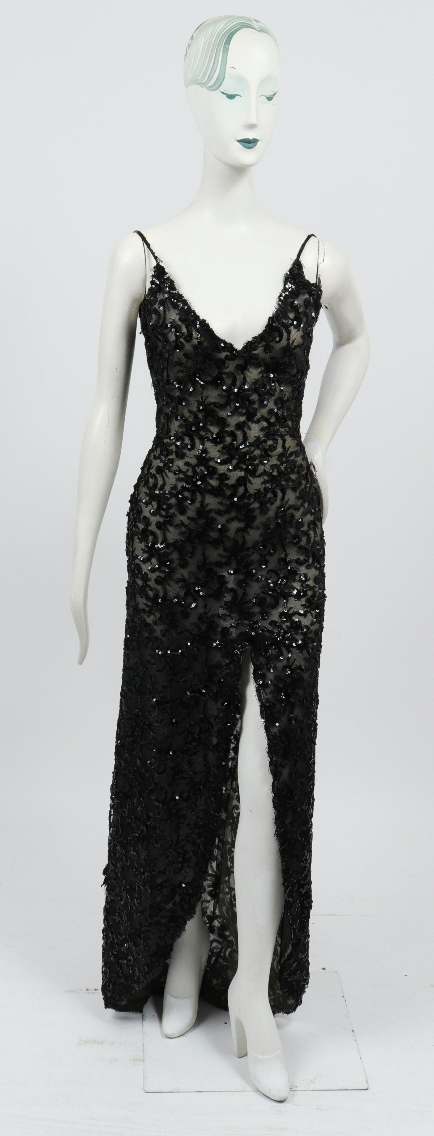Bill Blass Attrib Sequined V-Neck Evening Gown: Bill Blass attributed sequined V-neck evening gown / dress with sequined spaghetti straps, front slit, sheer nude gauze lining and back zipper closure. Bust: 15" W; waist: 12" W; hips: 16" W; length t