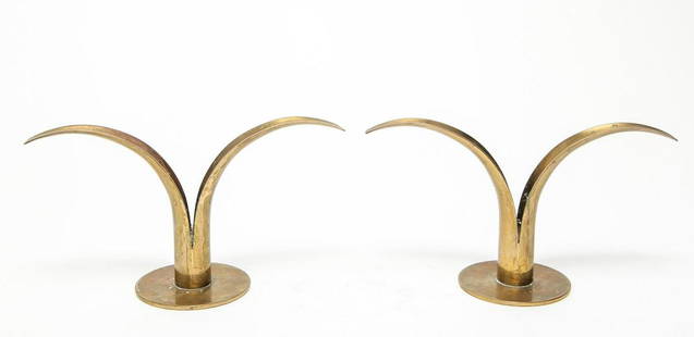 Ystad-Metall "Liljan" Lily Candle Holders, Pair: Pair of Ystad-Metall Swedish mid-century modern "Liljan" lily gilt brass candle holders, designed by Ivar Alenius-Bjork, the undersides marked "Ystad Metall / Sweden." 4.5" H x 8.25" W.