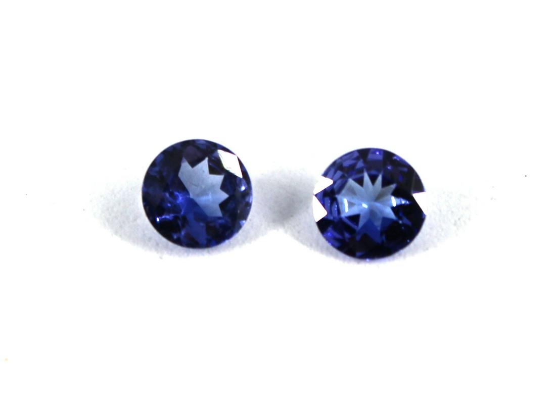 1.30 cttw Loose Round-Cut Tanzanite Stones, 2: 1.30 cttw. pair of loose round-cut faceted tanzanite stones; 6 mm. each.