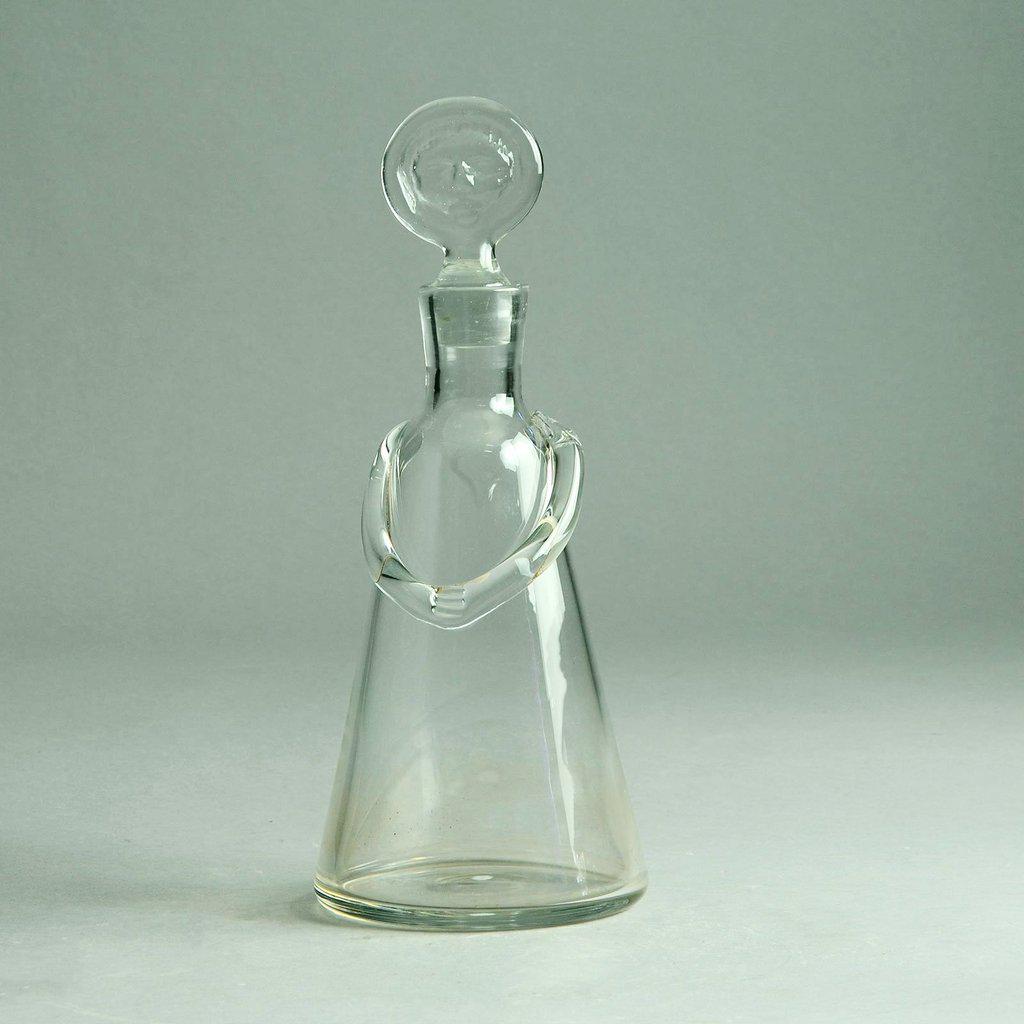 Mid-Century Modern Erik Hoglund Glass Decanter: Mid-Century Modern Erik Hoglund for Boda, Sweden clear glass decanter, engraved "H1332/65," circa 1950s. 12" H x 4.5" W.