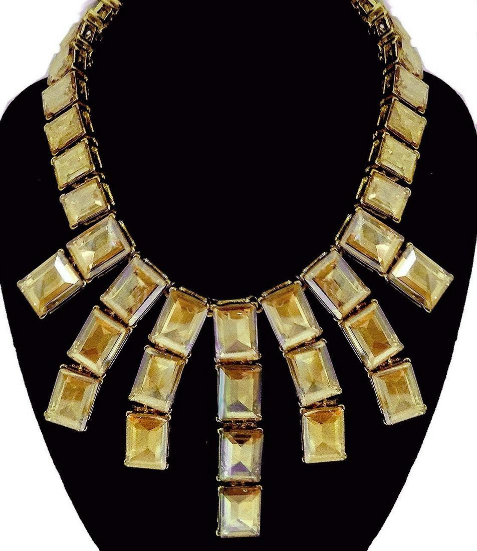 Kenneth J. Lane Faux Citrine Crystal Necklace: Kenneth J. Lane necklace featuring faux citrine crystals in a gold-tone setting and hook closure. 18" L. Front drop: 3.25" L.