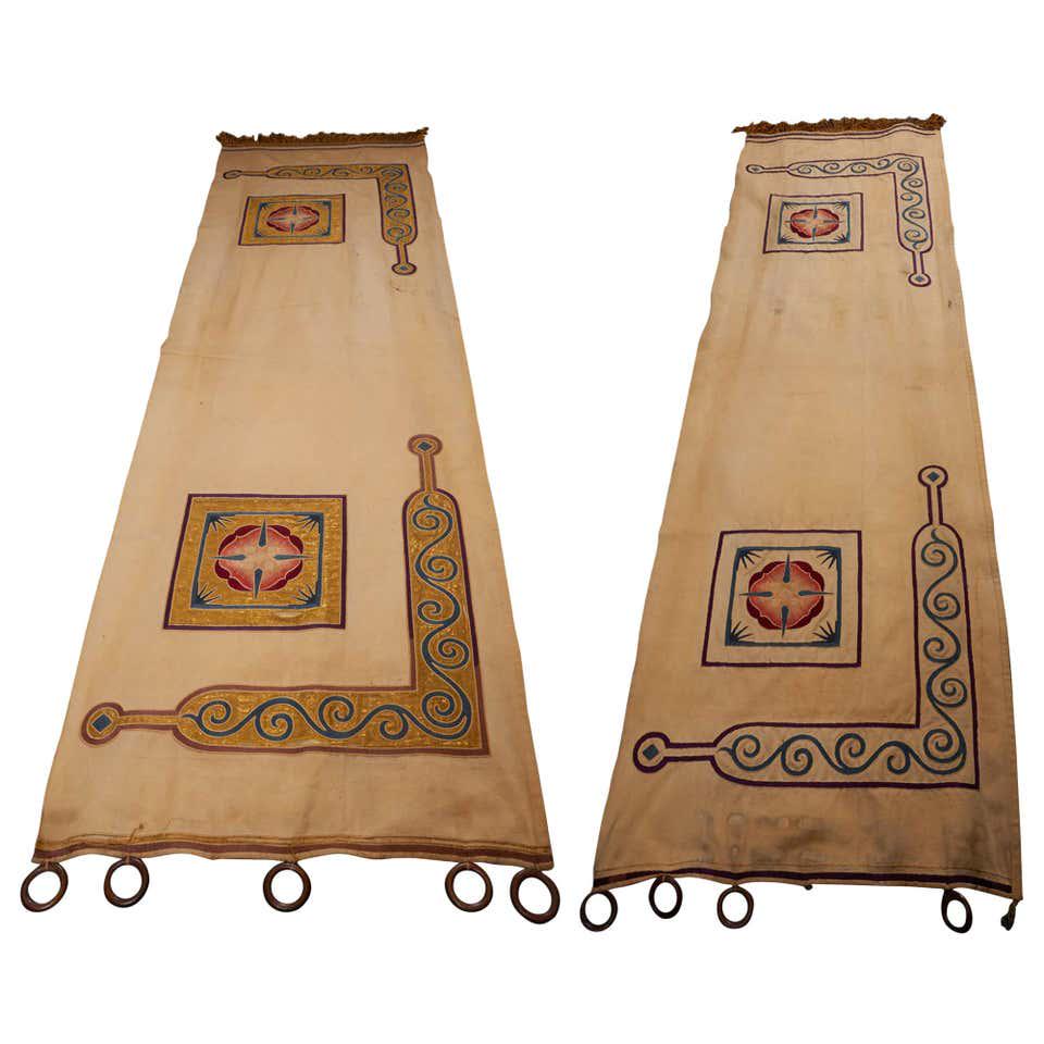 Arts & Crafts Reversible Portiere Archway Curtains: Pair of reversible late 19th / early 20th century heavy cotton canvas Arts & Crafts archway portiere curtains with hand embroidered fronts and the backs featuring metallic gold threads and shades of b