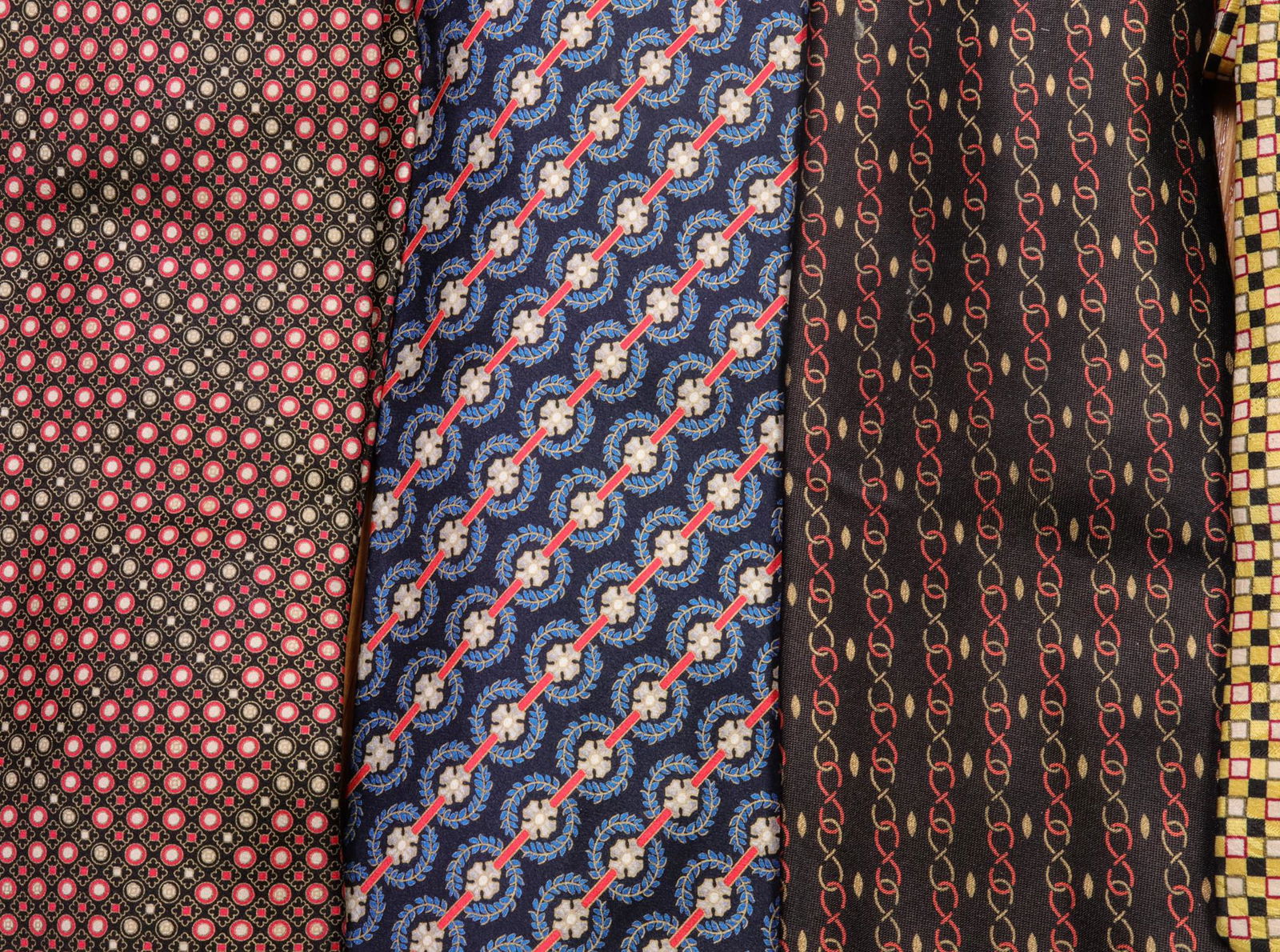 Brioni Men's Designer Silk Neckties, 5: Brioni men's designer patterned silk neckties, group of five, each labeled for "Brioni." Longest: 64" L x 4" W.