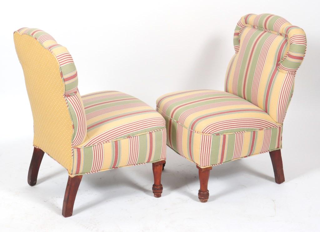 Upholstered Slipper Chairs, Pair: Pair of upholstered slipper chairs with wavy padded railing and exposed feet. Each: 33" H x 23" W x 21" D.