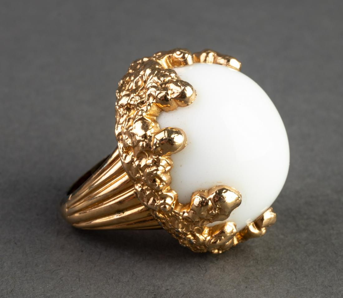 Jomaz Mid-Century Modern White Cabochon Ring: Jomaz mid-century modern / Brutalist white cabochon ring set in gold-tone bezel, signed "Jomaz." Ring size: 6.
