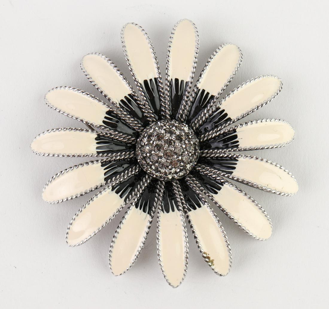 Ben-Amun Rhinestone & Enameled Daisy Brooch: Ben-Amun daisy flower brooch / pin with rhinestone center and black and white tone enameled petals, hallmarked to reverse. 3.25" diameter.