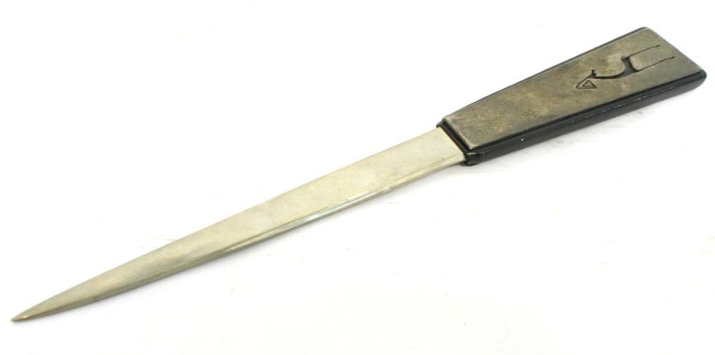 Israeli Mid-Century Letter Opener: Leather handle mounting plaque with incised stylized antelope motif, embossed "Hand made / Israel" and with Hebrew inscription on reverse. 7.5" L.