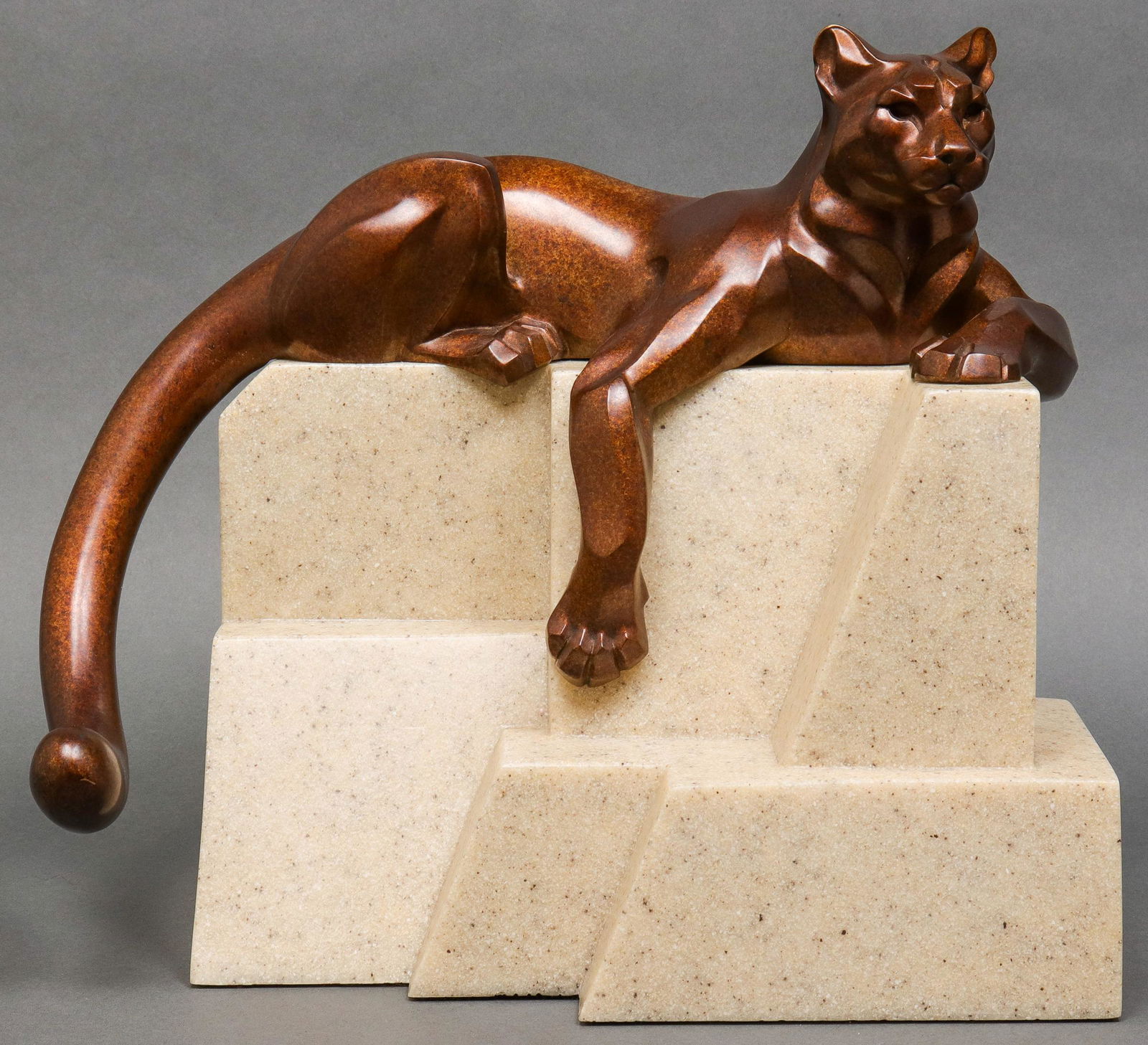 Janet Rosetta Bronze "Cougar" Sculpture: Janet Rosetta (American, b. 1945) "Cougar" bronze sculpture, on composite rock form base, in the Art Deco manner, stamped, dated, and numbered on back leg "Rosetta Â©90 24 / 24," gallery label to un