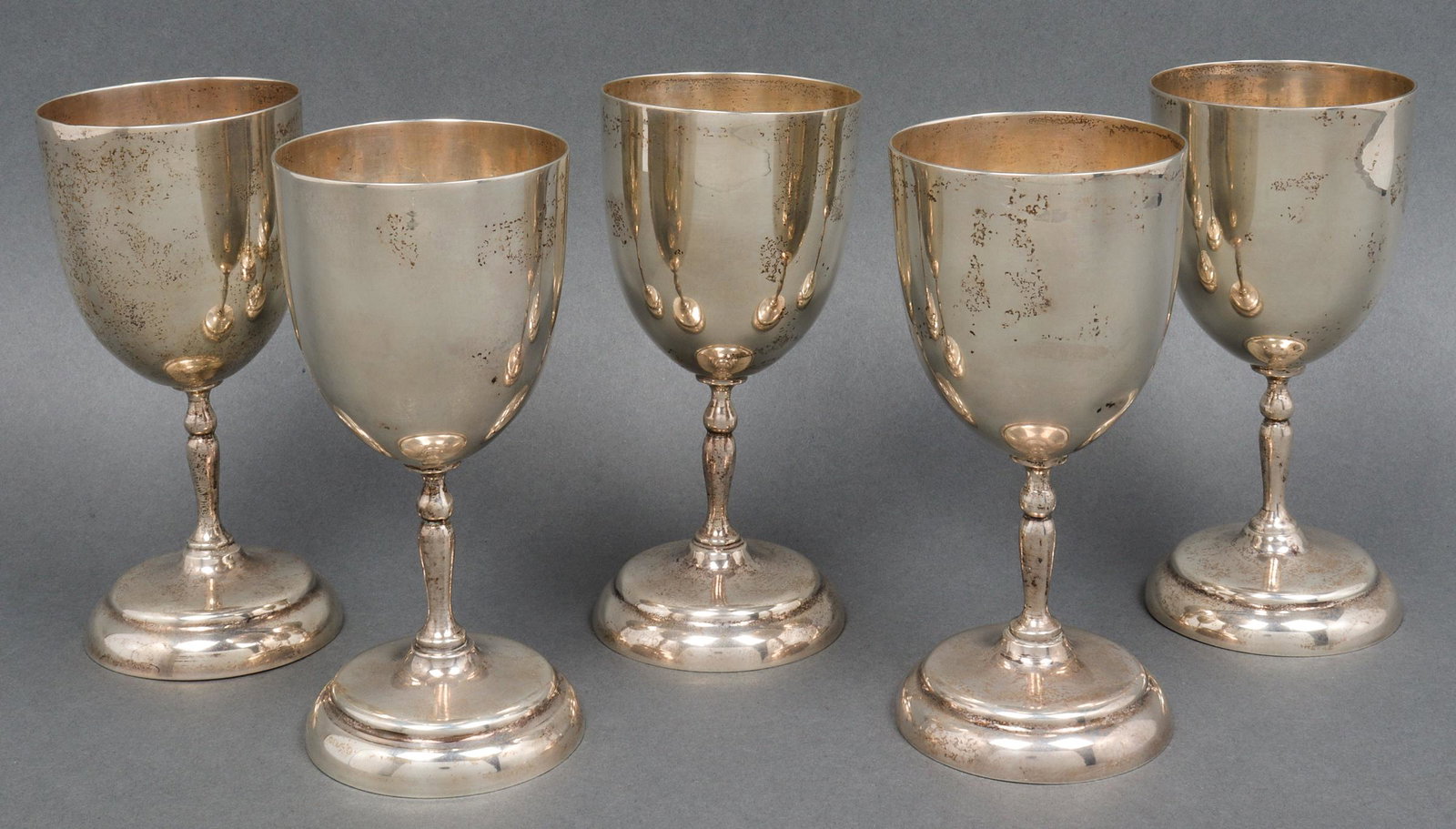 Taxco Perlita Mexico Sterling Silver Goblets, 5: Set of five sterling silver wine goblets, each stamped to underside "Taxco Perlita Mexico Sterling 925" with eagle mark. 6.5" H x 3" diameter. Approx: 33.54 ozt.