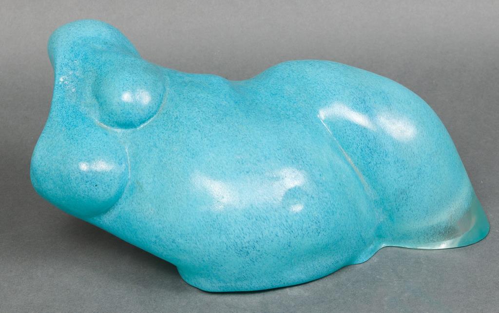 Turquoise Art Glass Nude Torso Modern Sculpture: Blue art glass sculpture depicting the torso of a reclining female nude. 5.5" H x 12" W 6.75" D.