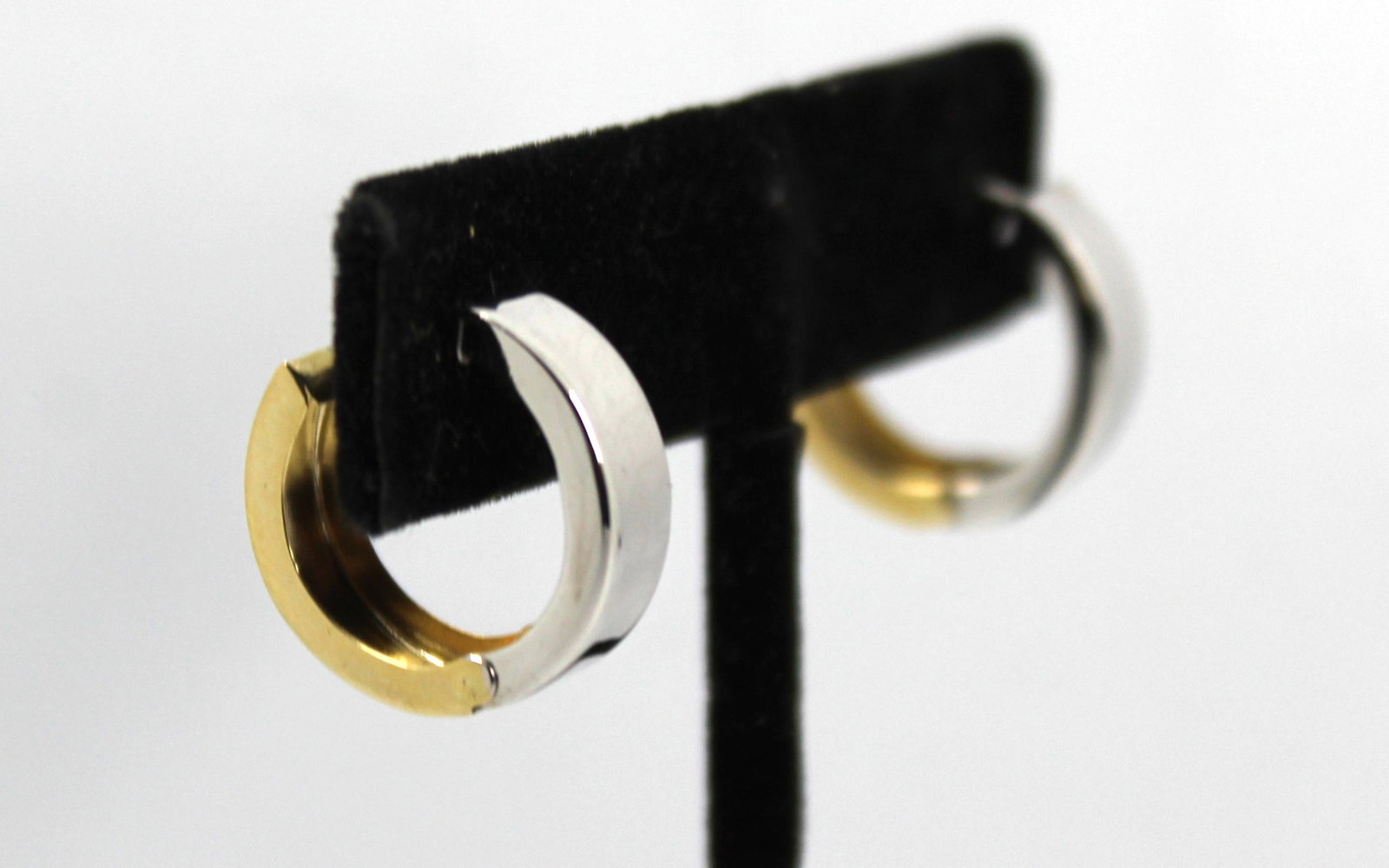 Atasay Designer 14K Yellow and White Gold Earrings: Atasay Jewelry designer 14K yellow and white gold hinged hoop drop earrings with post clasps, marked "AK 14K Turkey." Approx: 0.625" diameter. Approx: 1.7 dwt.