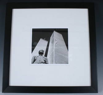 Tseng Kwong-Chi 2001 Black & White Photo WTC: Tseng Kwong-Chi, signed in verso 1979. Black and white photo, with World Trade Center in background. Gelatin print with estate stamp on back. Framed. 7" x 7"