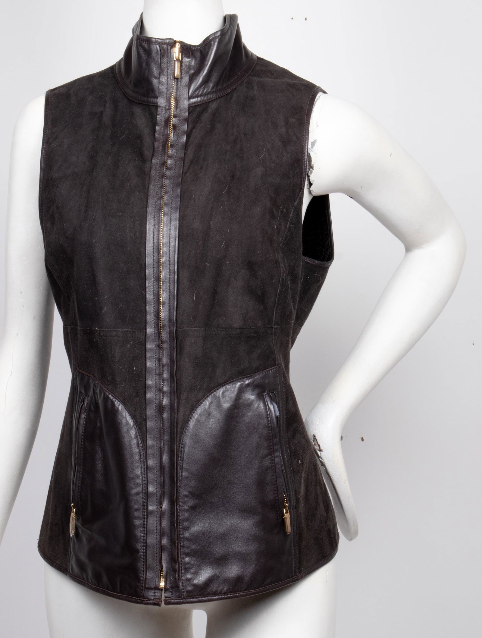 Croc Embossed Haircalf & Suede Reversible Vest: Reversible vest, one side with suede and leather side pockets, the other side with croc embossed haircalf, gold-tone zipper closure to front and pockets. Bust: 17" W; waist: 16" W; length: 22.25" L. P