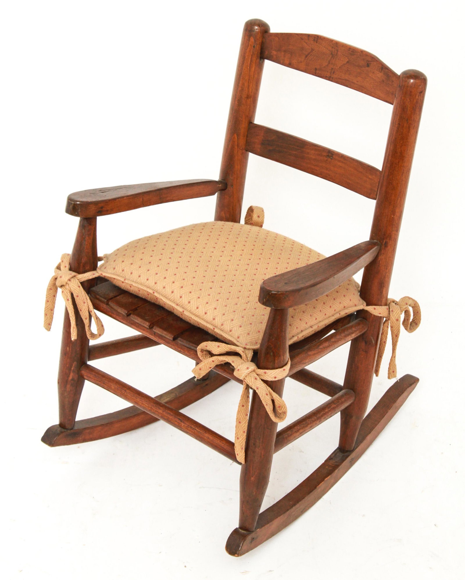 American Ladder Back Child's Rocking Chair: American child's / miniature ladder back rocking chair. 23" H x 14.75" W x 19.5" D.