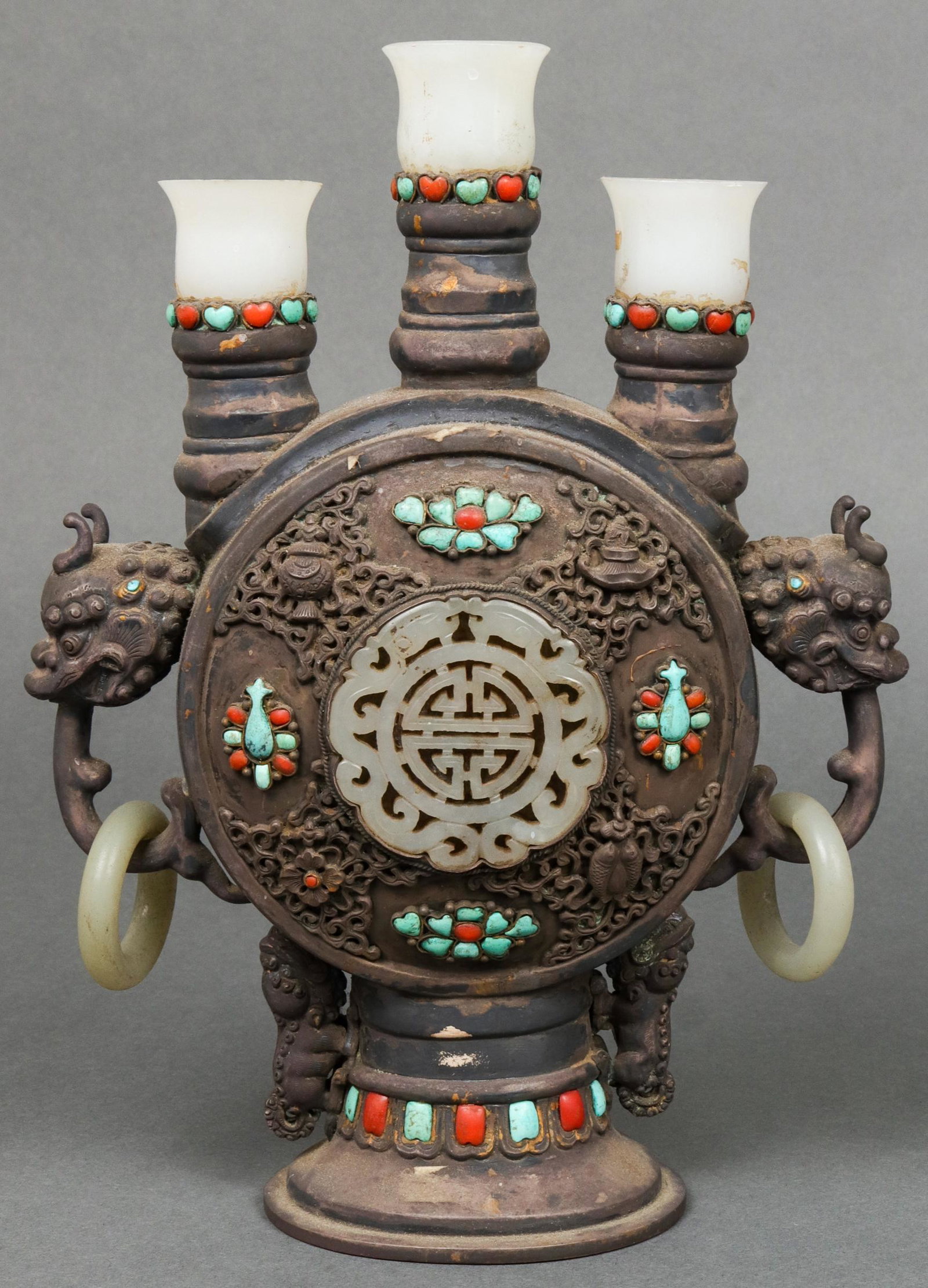 Antique Chinese-Tibetan Silver & Jade Garniture: Antique Mongolian style or Chinese-Tibetan silver and jade triple bottle vase or candleholder altar garniture, central jade medallion surrounded by relief scrolling lotus and miniature symbols, inset 