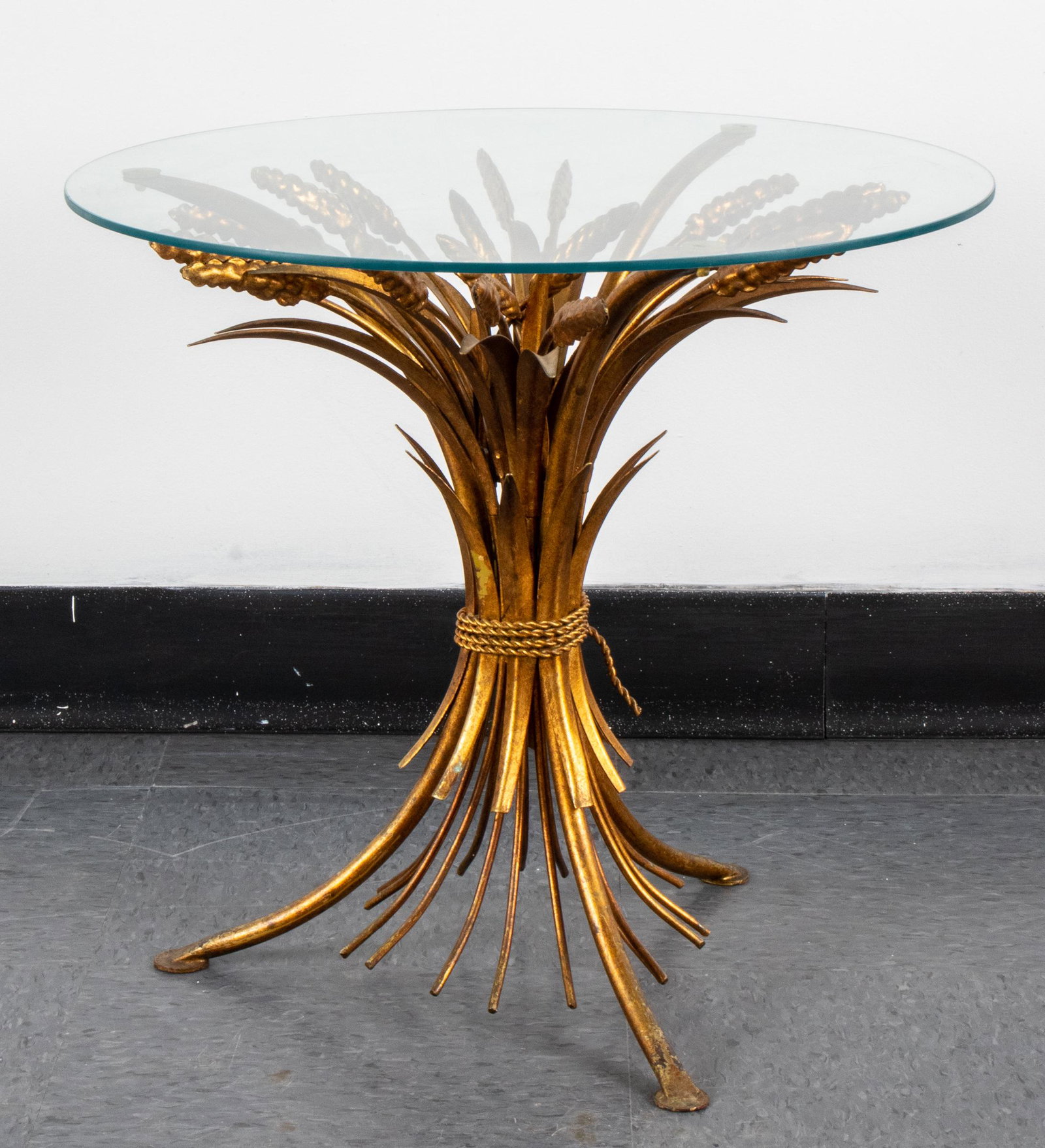 Italian Gilt Sheath of Wheat & Glass Top Table: Italian gilt metal sheath of wheat base occasional table, with circular glass top. 18.25" H x 19.25" diameter. Minor loss to gilding.