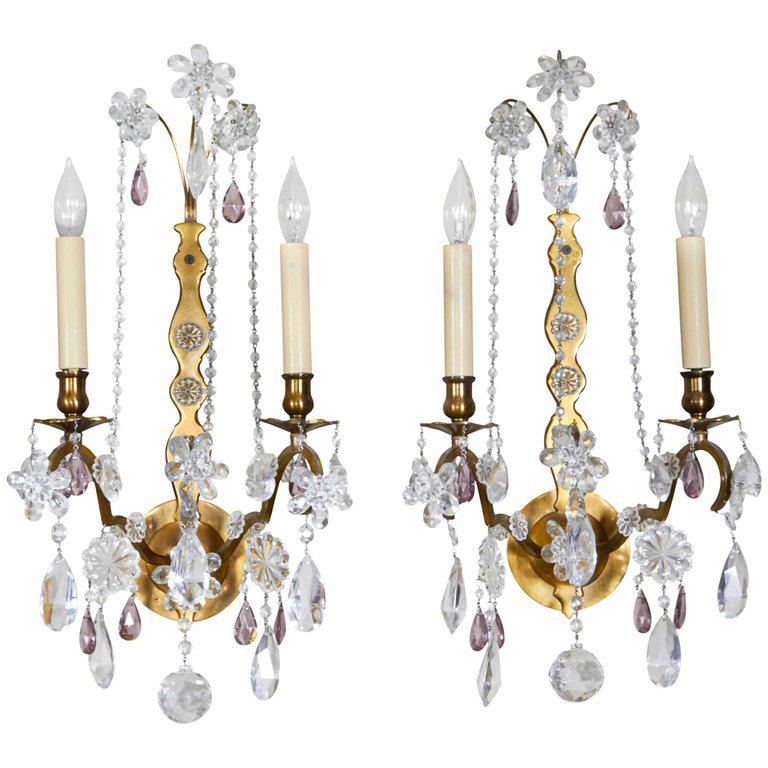 Neoclassical Style Sconces w Crystal Florets Pair: Pair of Neoclassical style metal two-arm sconces, with clear and amethyst color crystal beads and florets. 20" H x 10" W x 6.75" D.
