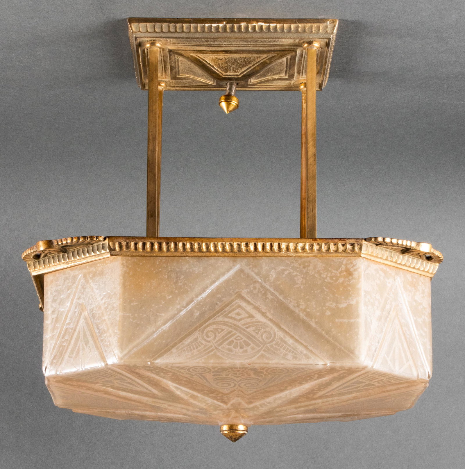 Art Deco Brass & Glass Ceiling Fixture Chandelier: Art Deco cast brass ceiling fixture / chandelier with a frosted and etched light rose colored glass shade, with four lights.16" H x 15.5" W x 13.5" D.