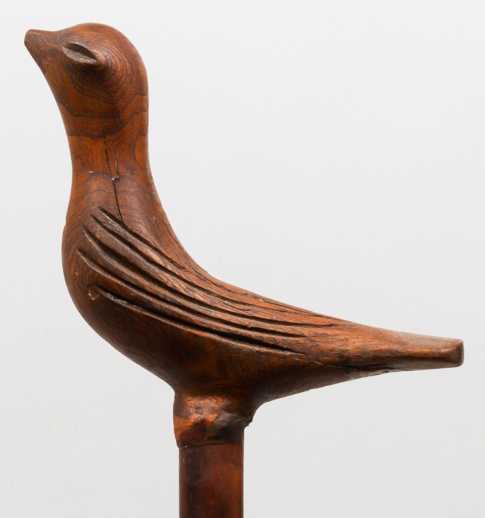 American Folk Art Carved Wood Bird Walking Cane: American Folk Art / primitive carved wooden walking stick / cane, the handle in the form of a bird. 36.5" L.