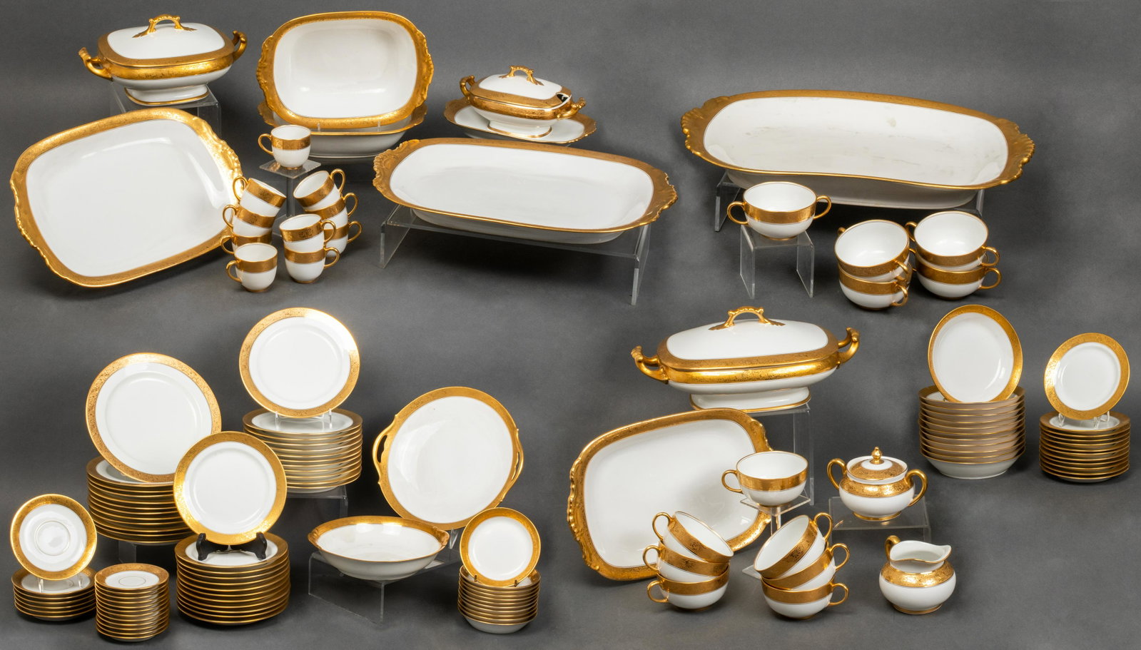 Vignaud Limoges Porcelain Dinner Service, 114 Pcs: Vignaud Limoges porcelain partial dinner service, 114 pieces, white ground with gilt encrusted rim, comprising 12 dinner plates, 12 luncheon plates, 12 soup bowls, 12 dessert plates, 11 dessert bowls,
