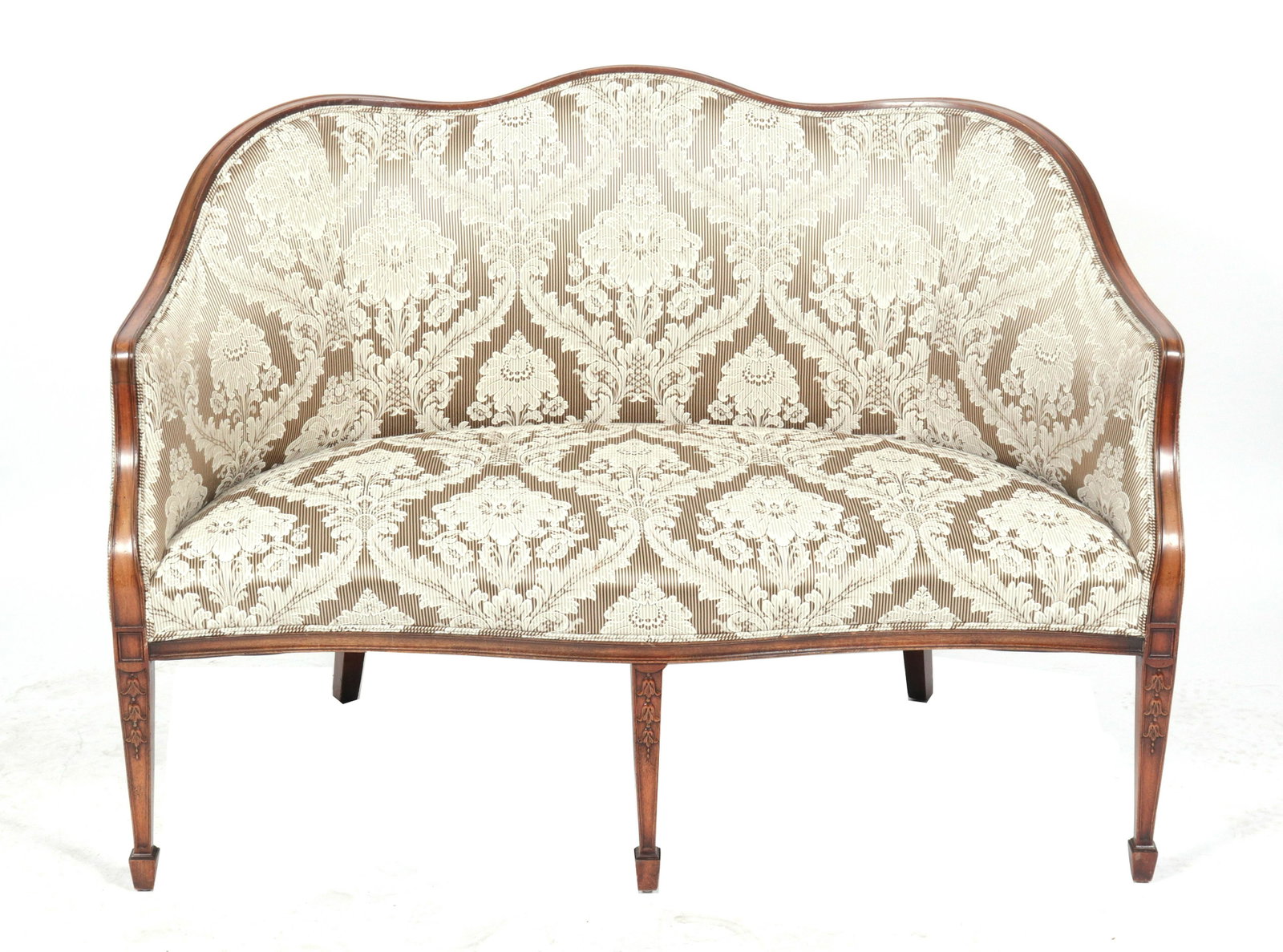 Louis XVI Manner Upholstered Settee: Louis XVI manner settee / sofa with exposed wood frame with curved camel back, concave arms, and damask brocade upholstery over foliate carved tapering legs. 36.5" H x 51" W x 29" D.