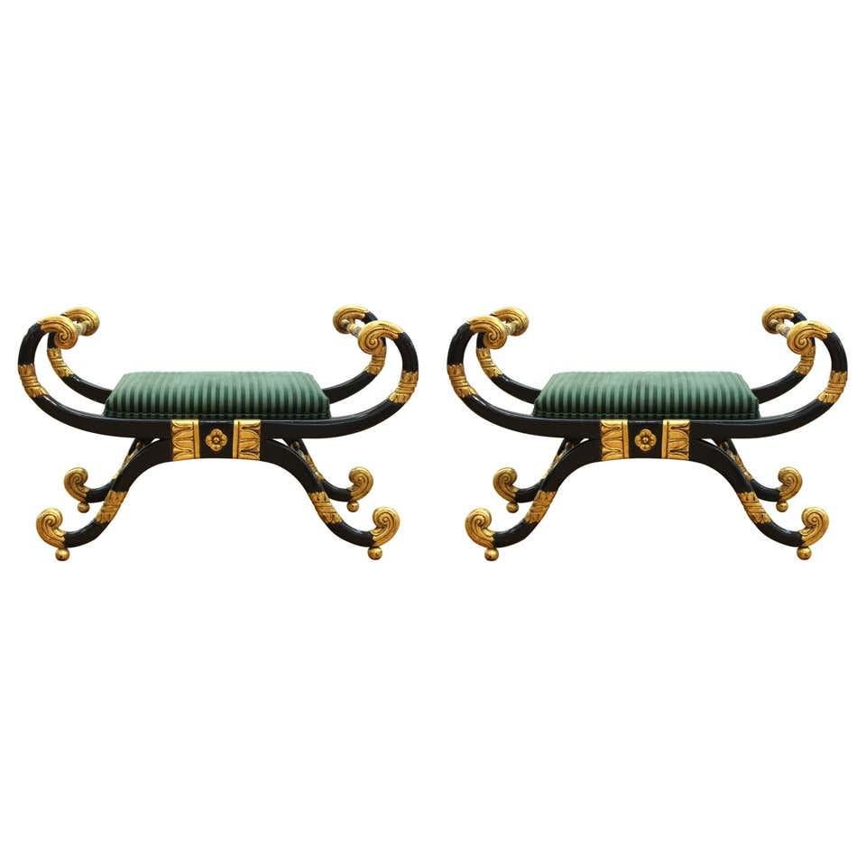 Regency Style Curule Form Window Benches, Pair: Pair of Regency style curule form window benches with scrolled gold and black painted wood cross-frames and ribbed stripe velvet upholstered seats. 24" H x 36" W x 16" D.