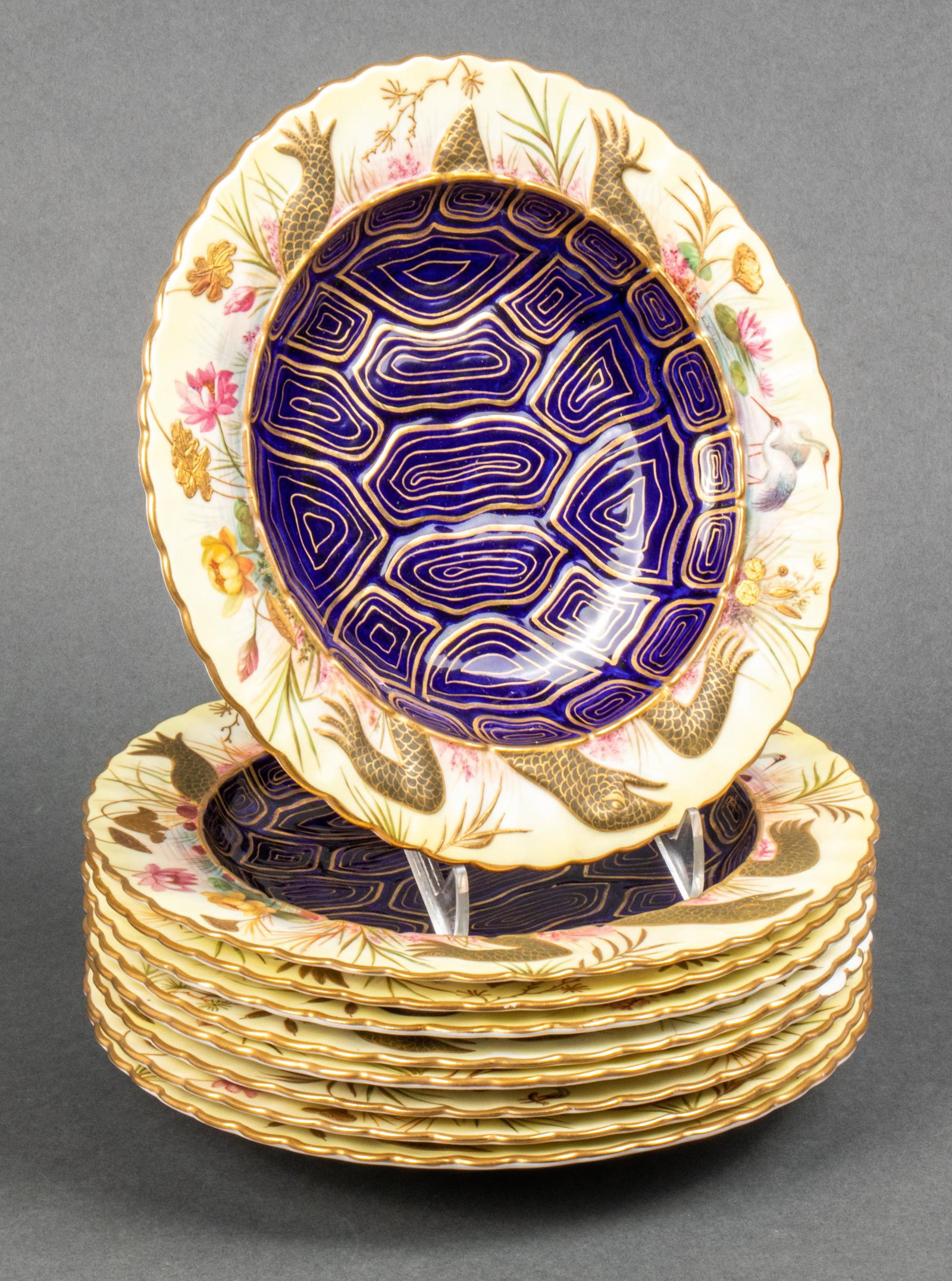 Moore for Tiffany & Co. "Turtle Soup" Bowls, 9: Moore England for Tiffany & Co. porcelain mock turtle soup bowls, turtle motif with cobalt blue and gilt detailed shell at center, rim with relief turtle head, legs, and tail along with hand-painted b