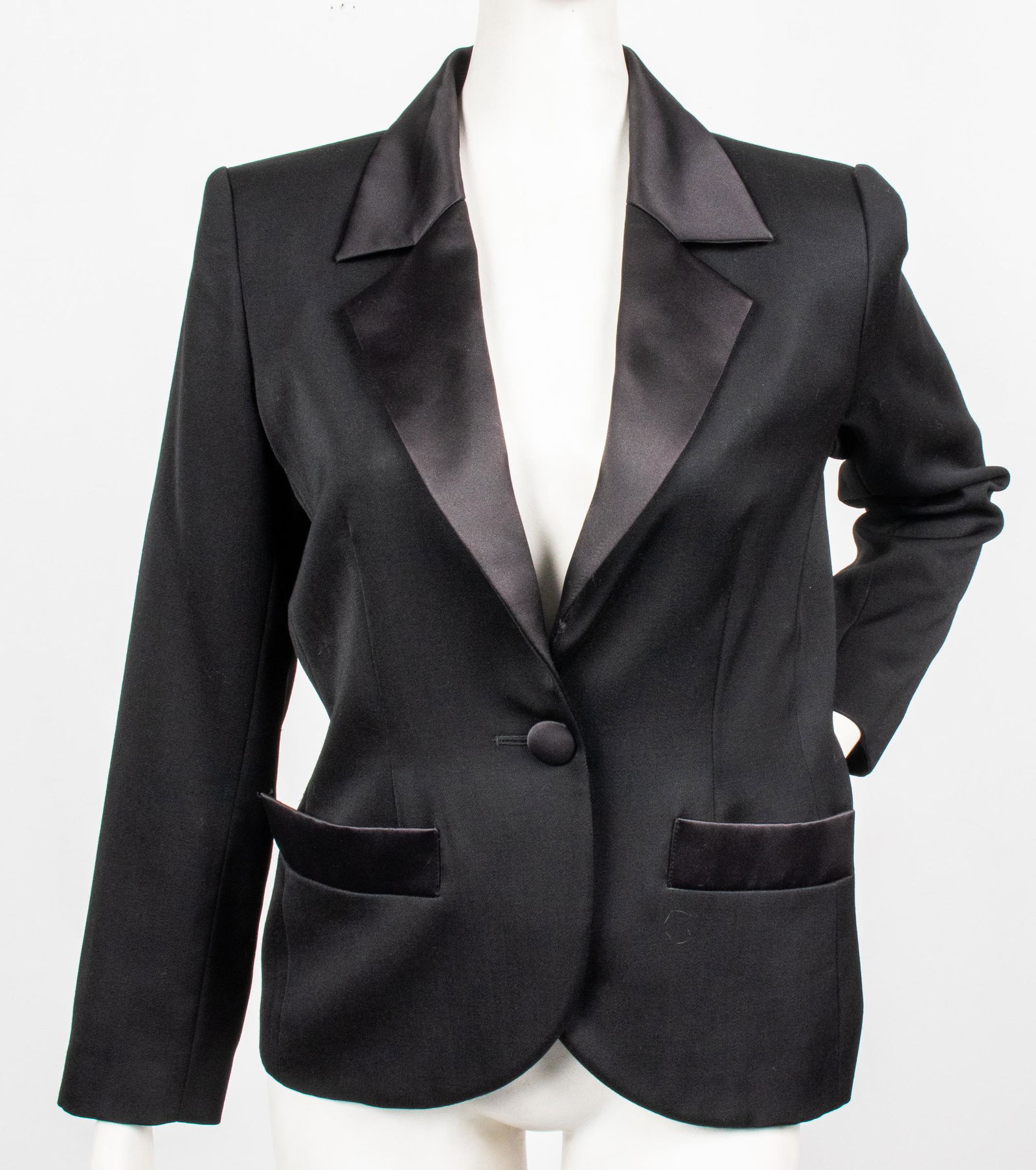 Yves Saint Laurent Tuxedo Jacket: Yves Saint Laurent tuxedo jacket with satin texture collar and lapel, wool blend shell, padded shoulders, single button closure and dual side pockets, designer's label and size "Yves Saint Laurent / l