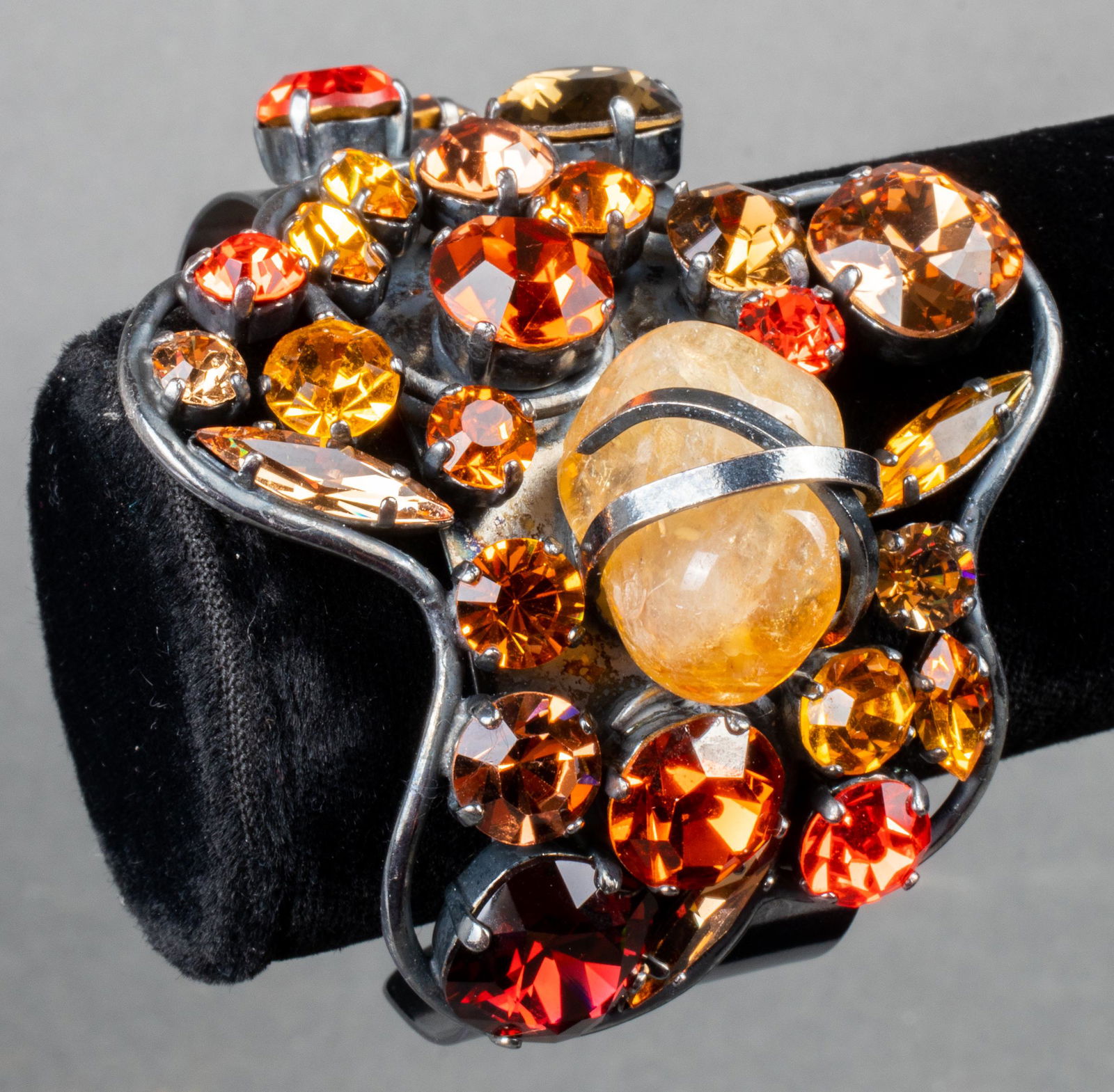 Philippe Ferrandis Quartz & Crystal Cuff Bracelet: Philippe Ferrandis Paris designer cuff bracelet featuring multicolor crystals with tumbled quartz bead in gunmetal setting, marked: "Philippe Ferrandis Paris." Inner circumference: 6.5" L. Gap opening