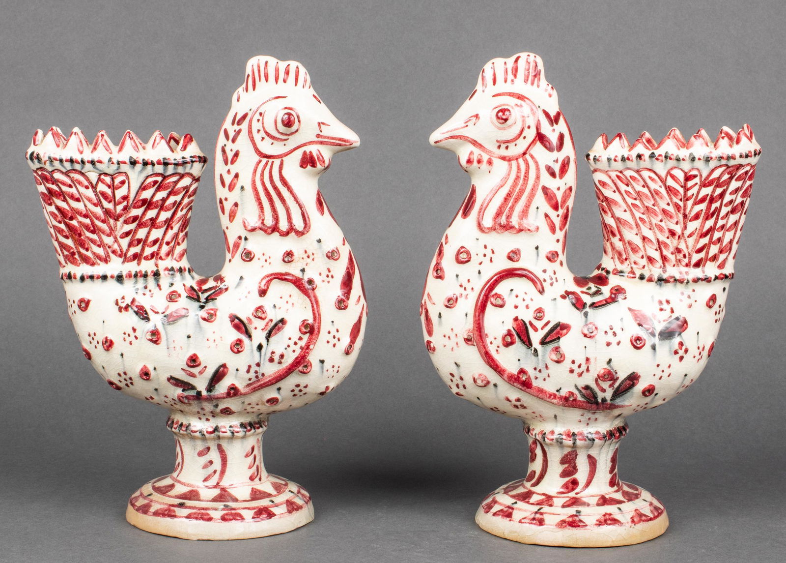 Carl Walters Stonelain Pottery Faience Roosters Pr: Pair of Carl Walters (1883-1955) for Stonelain Pottery faience rooster-form vases / bough pots, impressed maker's marks underside. 11" H x 8" W; base: 4.75" diameter.