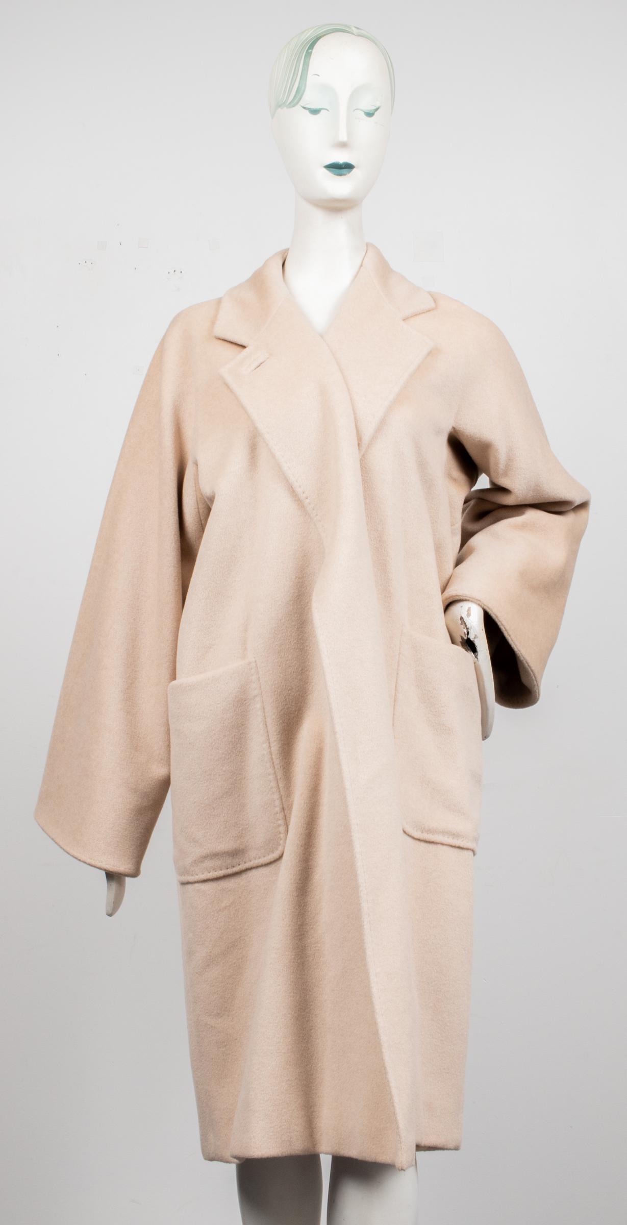 Max Mara Wool And Cashmere Trench Coat: Max Mara trench coat in tan wool and cashmere blend fabric, the front with single button closure and two patch pockets, the interior with logo lining and "Max Mara" label. Collar to hem 44.5”, shoul