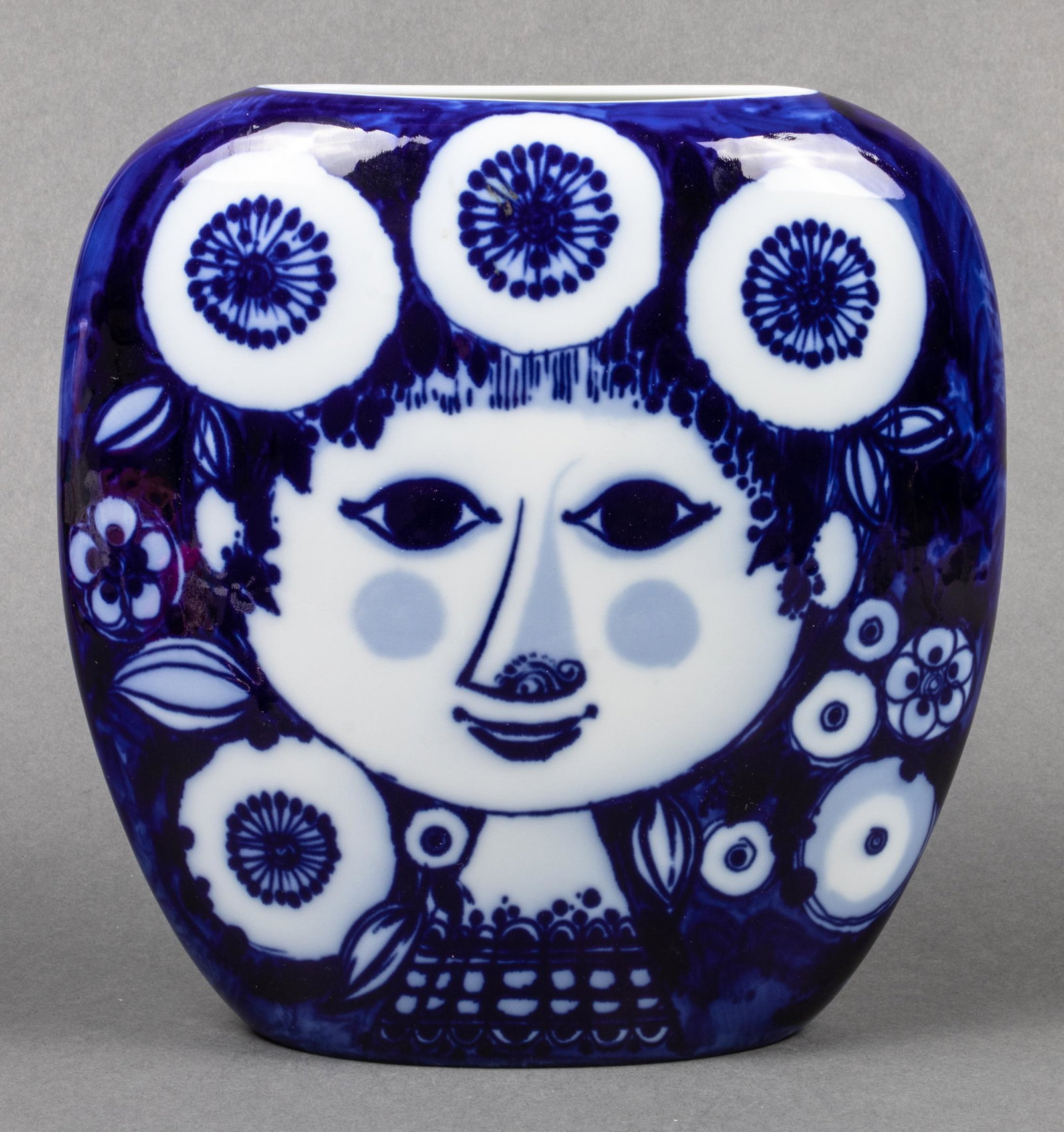 Bjorn Wiinblad for Rosenthal Modern Porcelain Vase: Bjorn Wiinblad for Rosenthal modern blue and white porcelain vase with whimsical figural decoration, makers mark underside. 8.75" H x 8.25" W x 3" D.