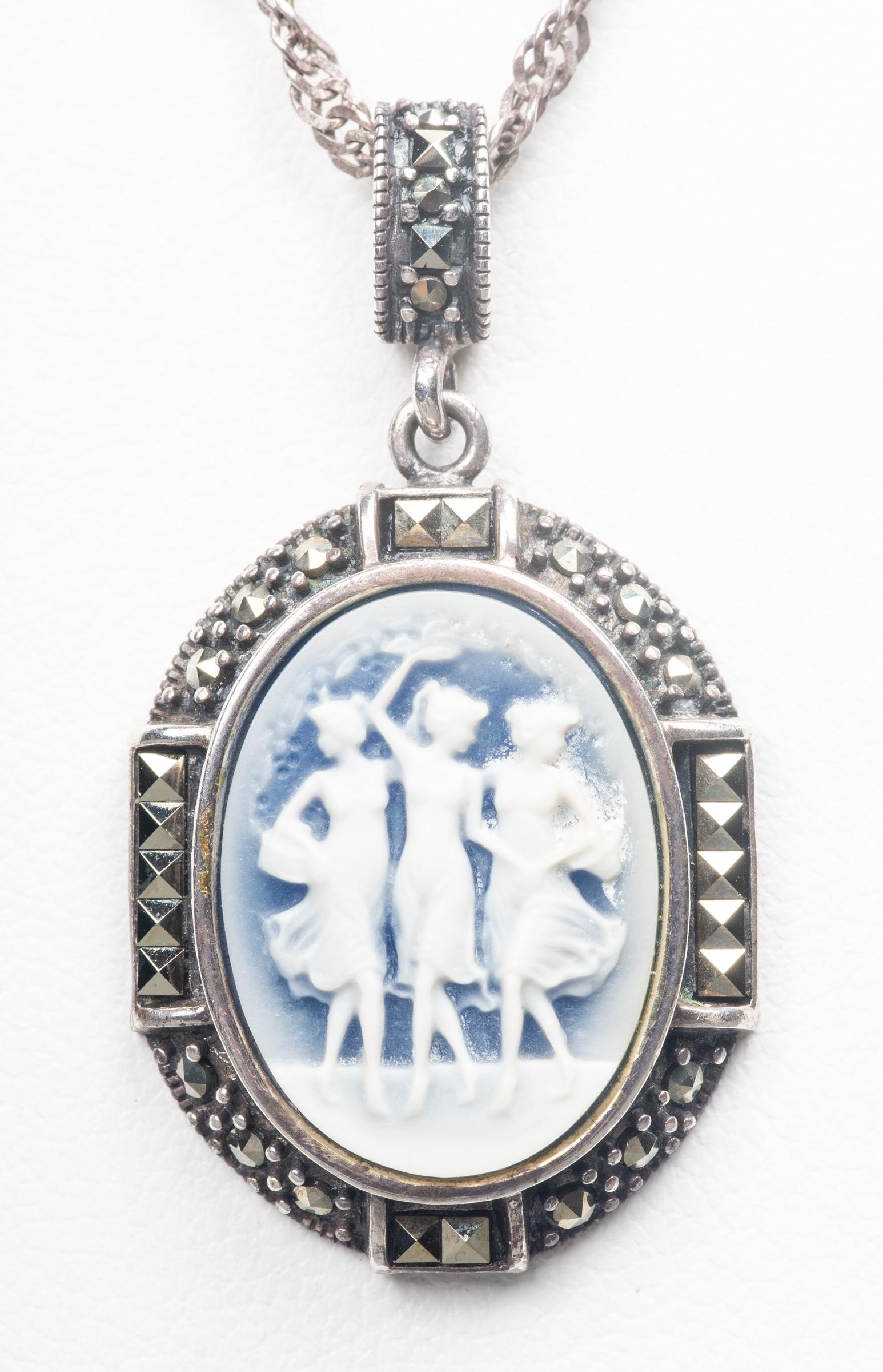 Silver & Marcasite Wedgewood Pendant Necklace: Sterling silver and marcasite wedgewood three muses pendant necklace, marked: "925 A/ ITALY". Pendant: 1.56"L x 0.875"W on 16"L x 0.125"W chain. Approx: 0.34 ozt. inclusive.