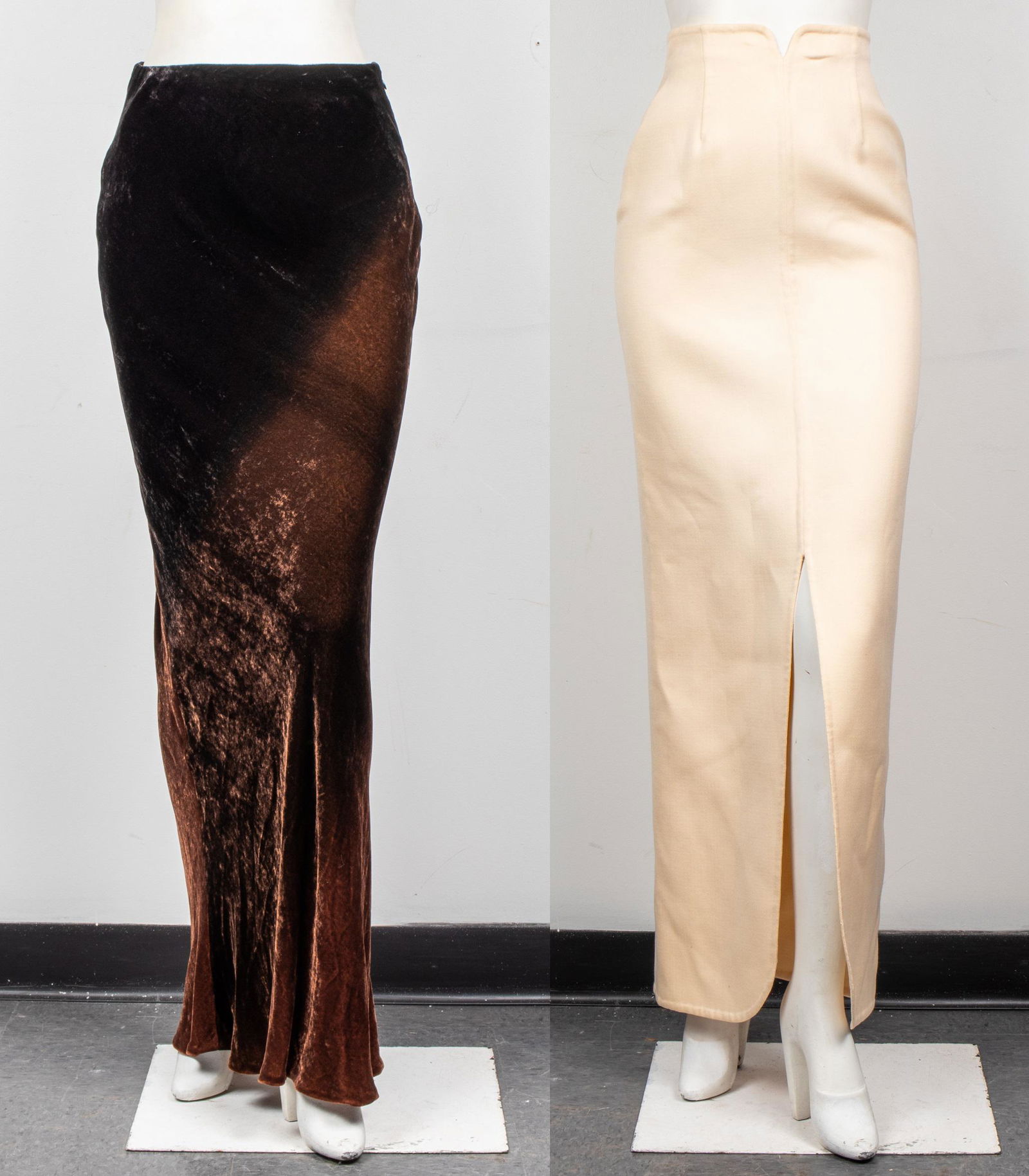 Bill Blass & Other Tall Full-Length Skirts, 2: Two tall full-length skirts, including an ombre velvet skirt with back zipper and designer's label "Bill Blass" to interior, and a wool skirt with front slit and back zipper without label. Larger wais